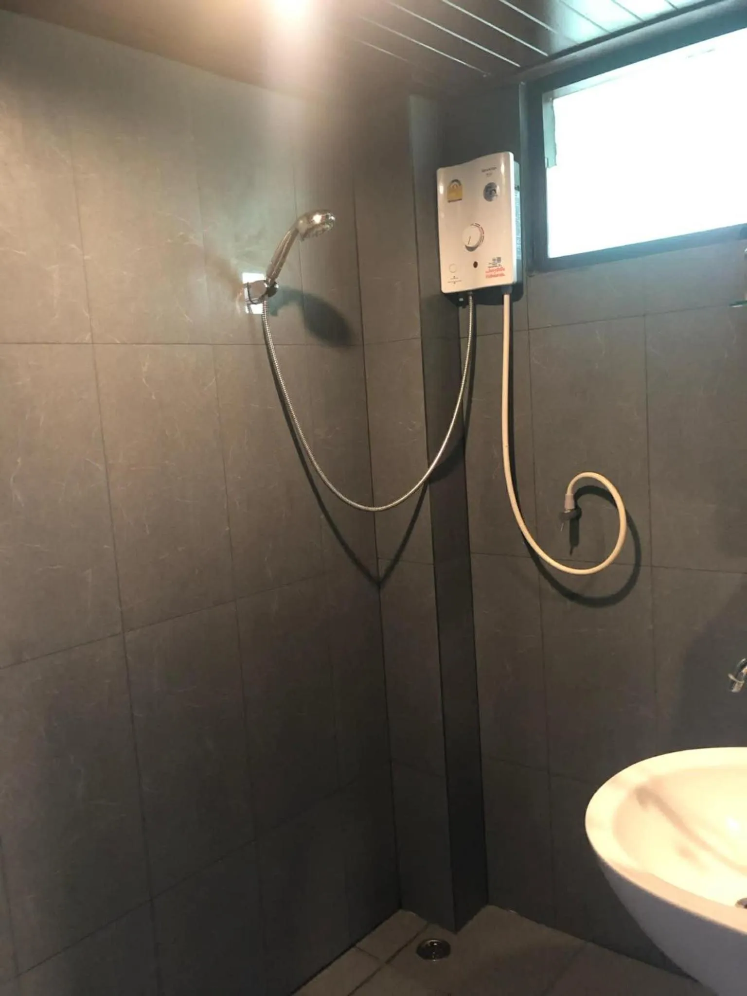 Bathroom in Phi Phi Green House & Sunsky Hostel