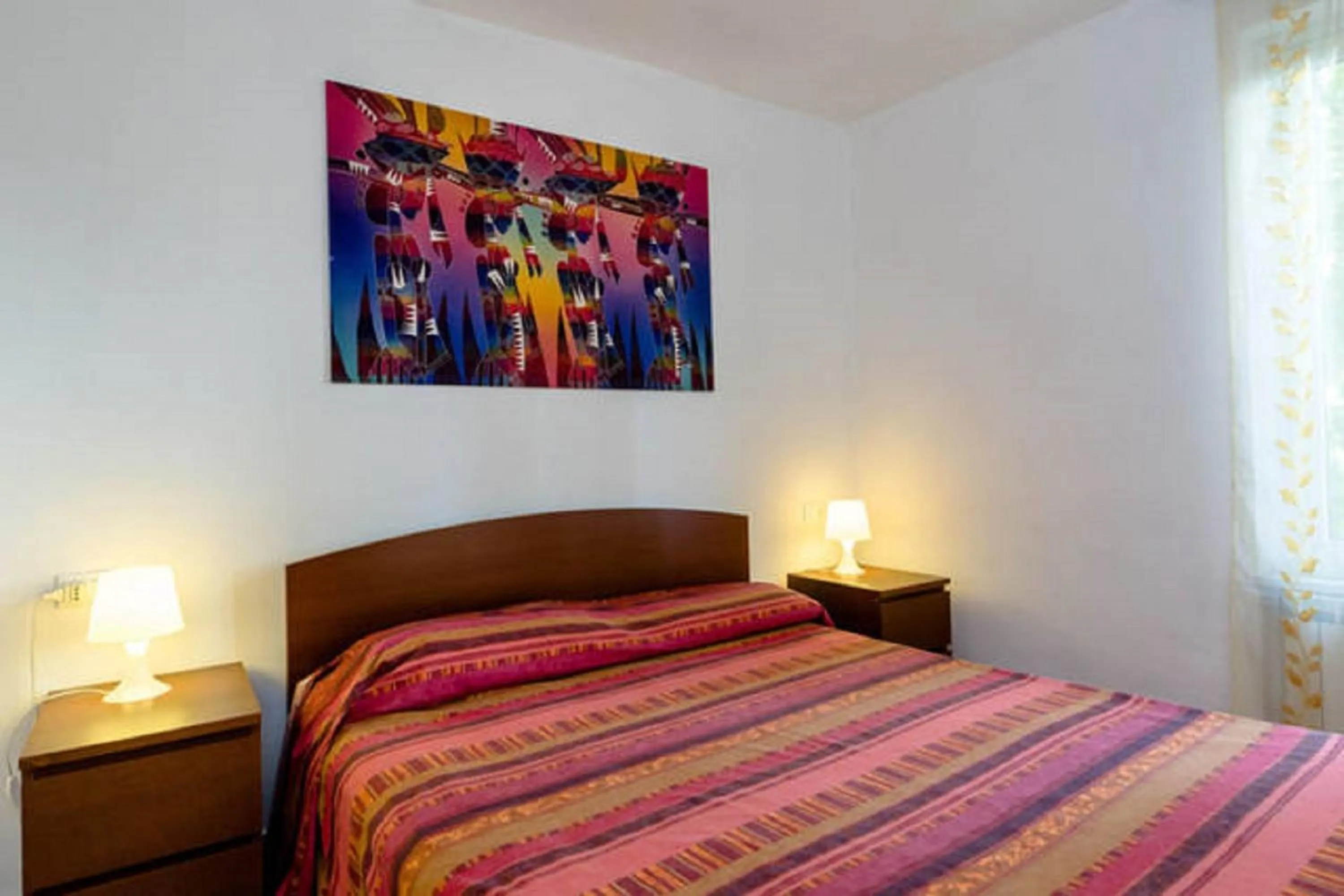 Bed in Varazze Apartment