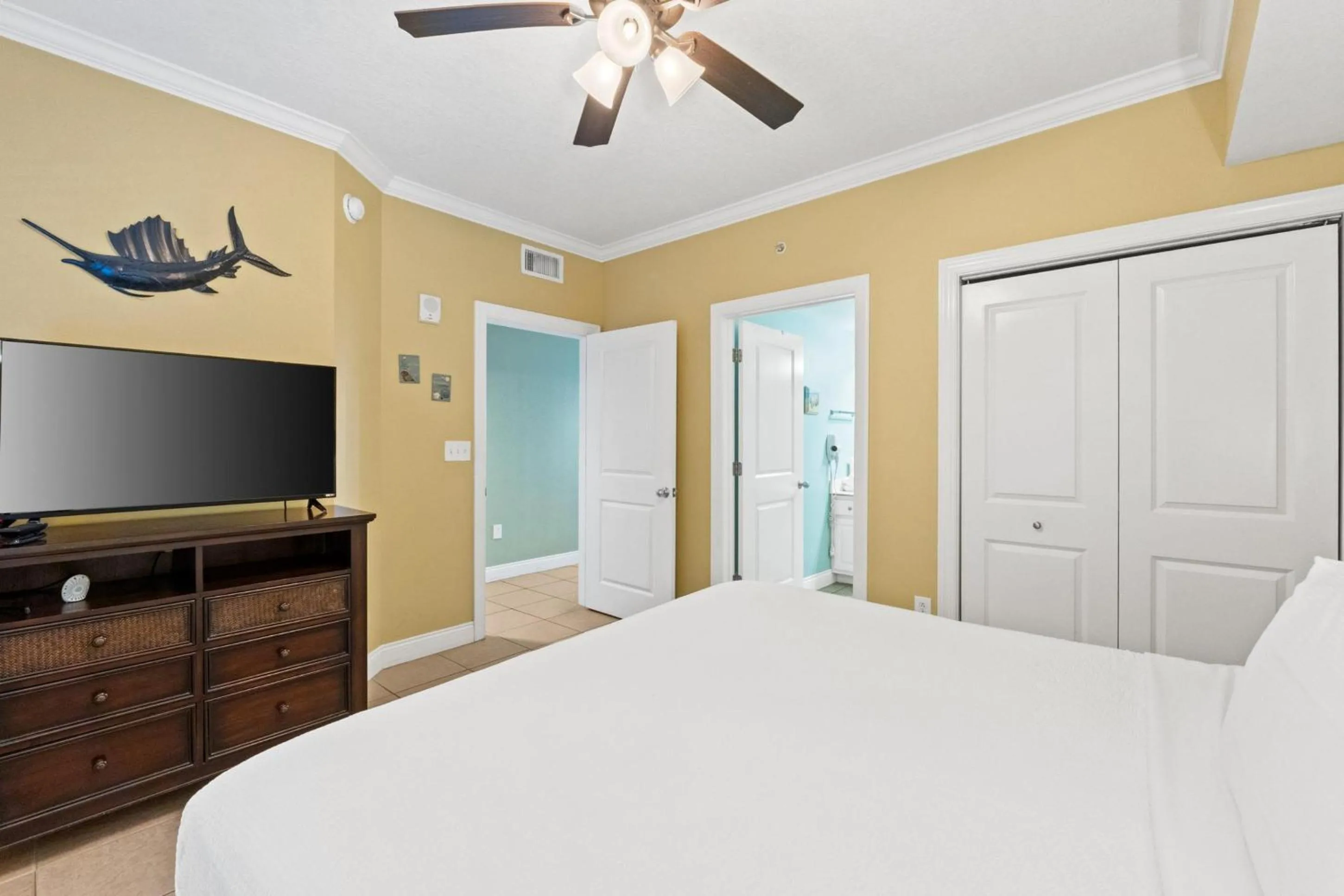 Bed in Palazzo Beach Resort by Panhandle Getaways