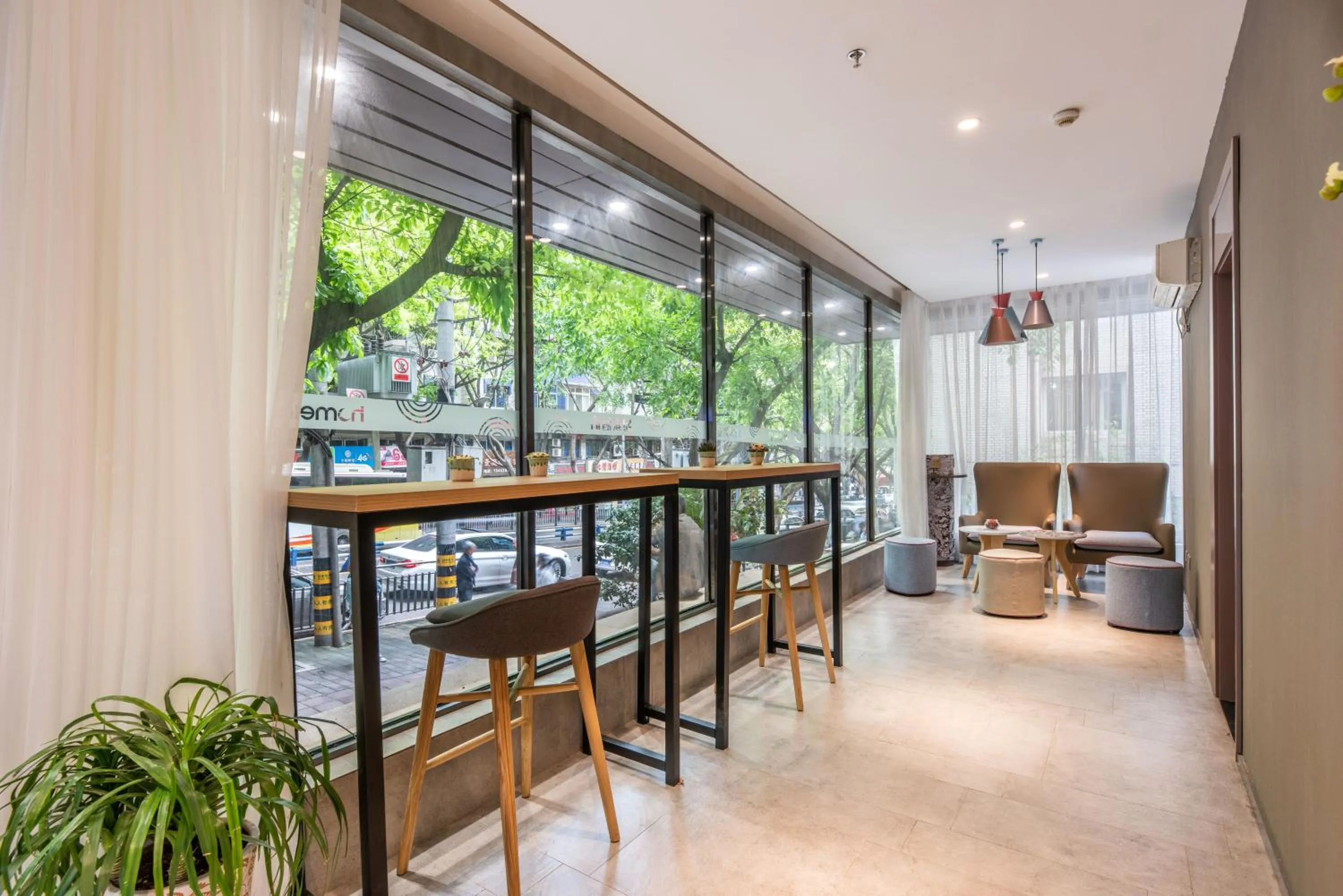 Communal lounge/ TV room in Home Inn Chongqing Jiangbei Airport Shuangfeng Road