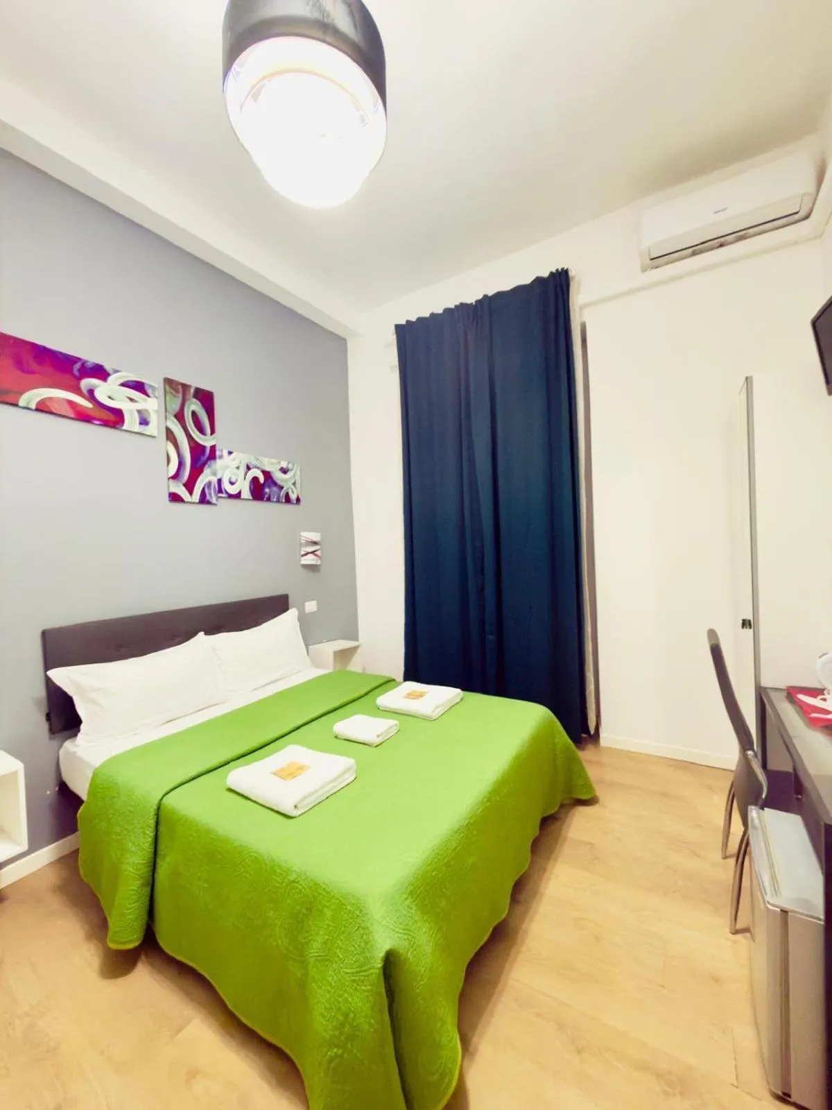 Bed in Oasi Guest House