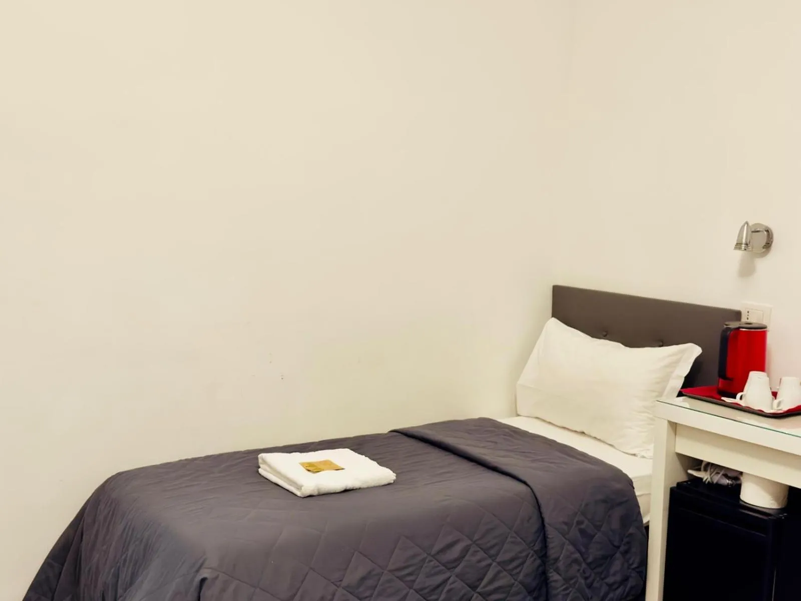 Bed in Oasi Guest House