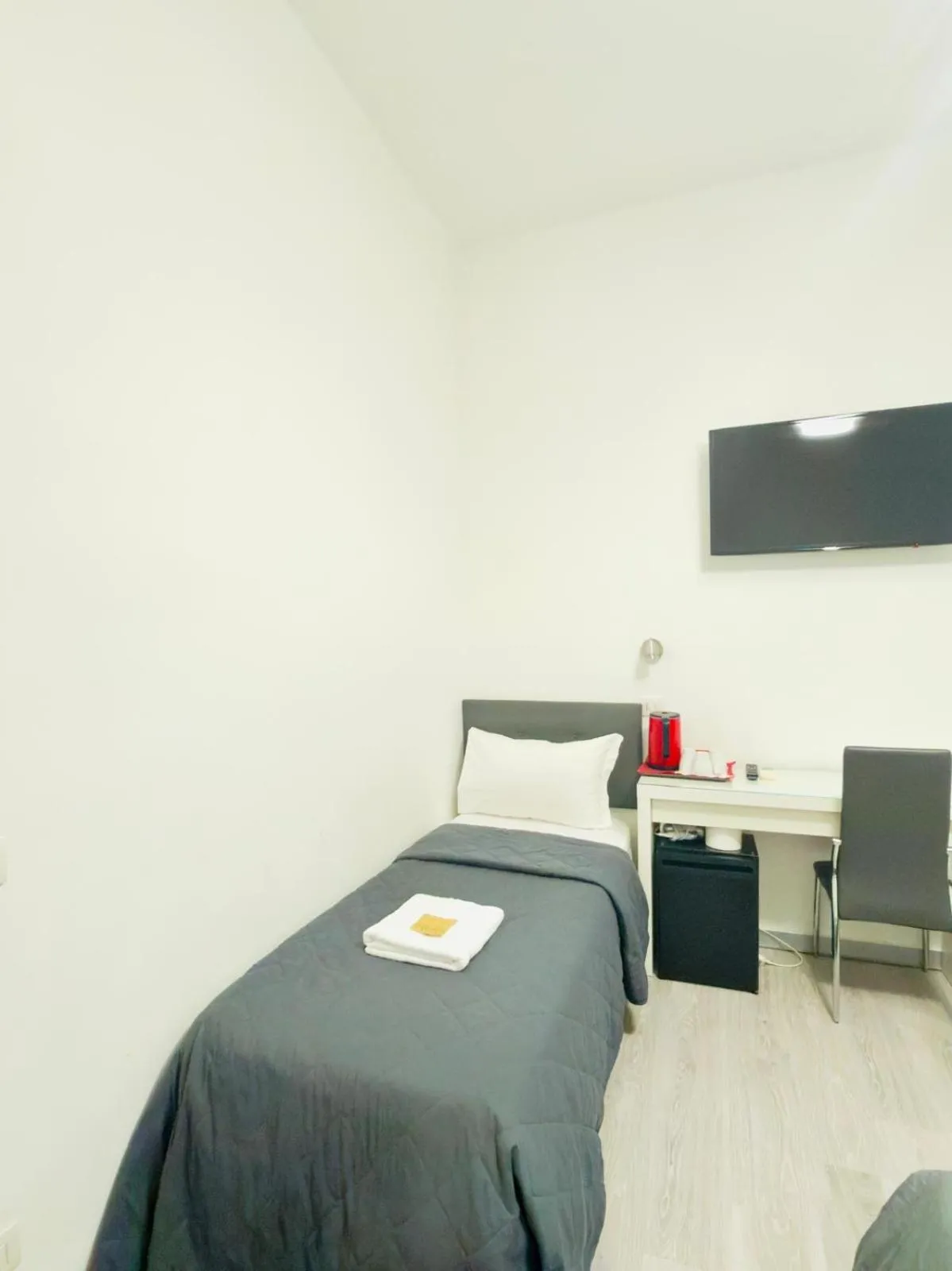 Bed in Oasi Guest House