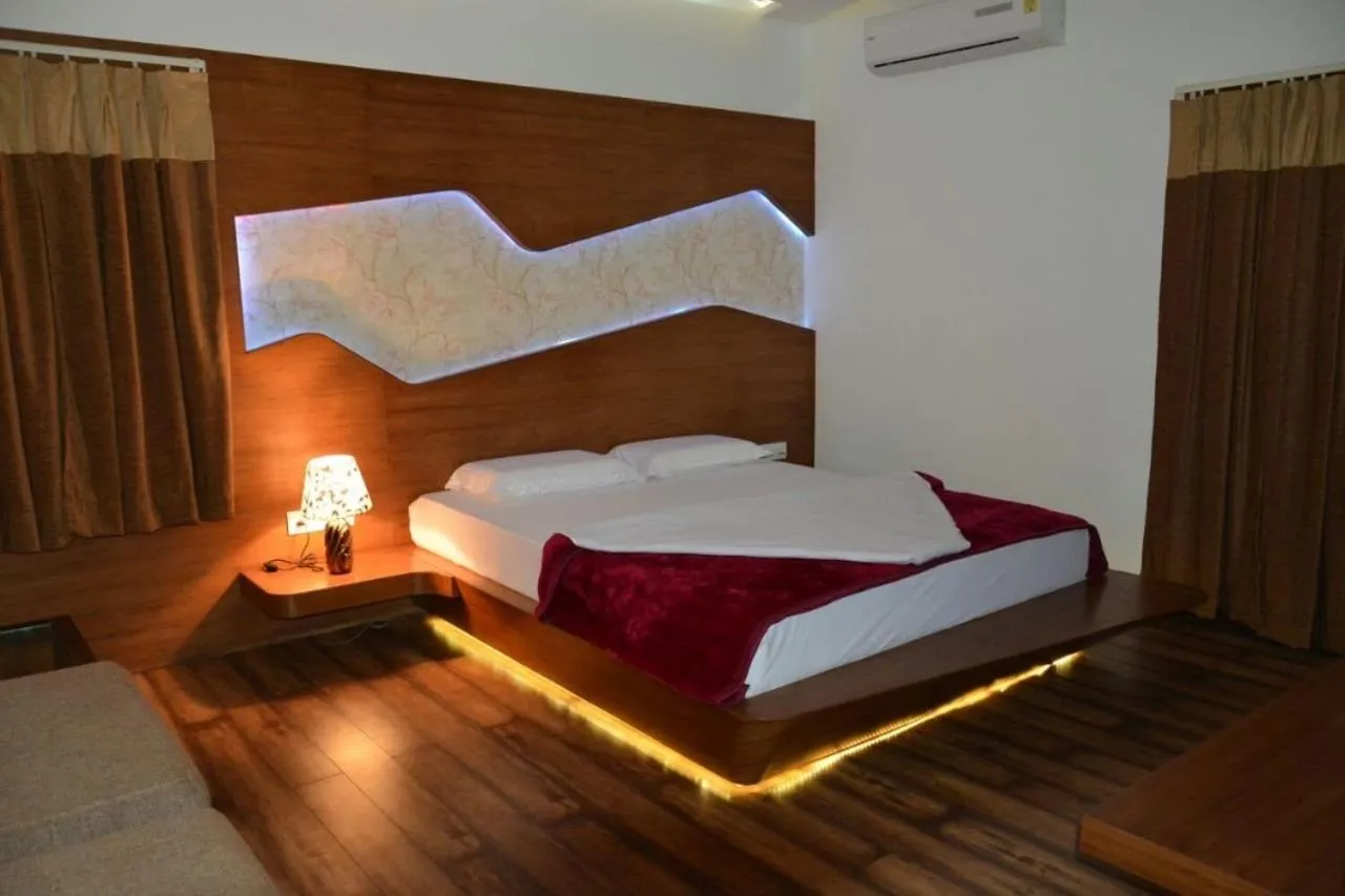 Bed in Sri Shivam Hotel