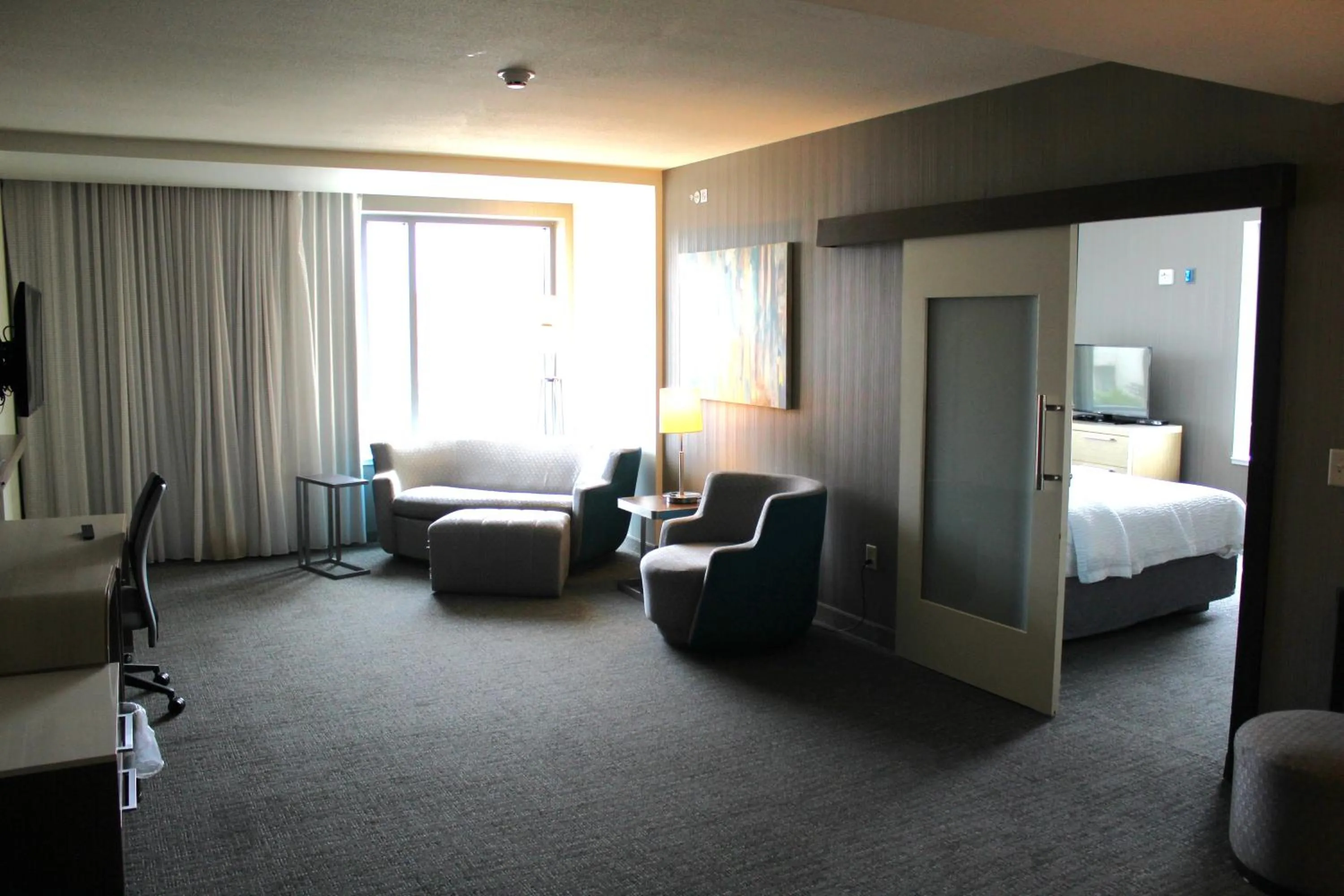 Living room, Bed in Courtyard by Marriott Muncie at Horizon Convention Center