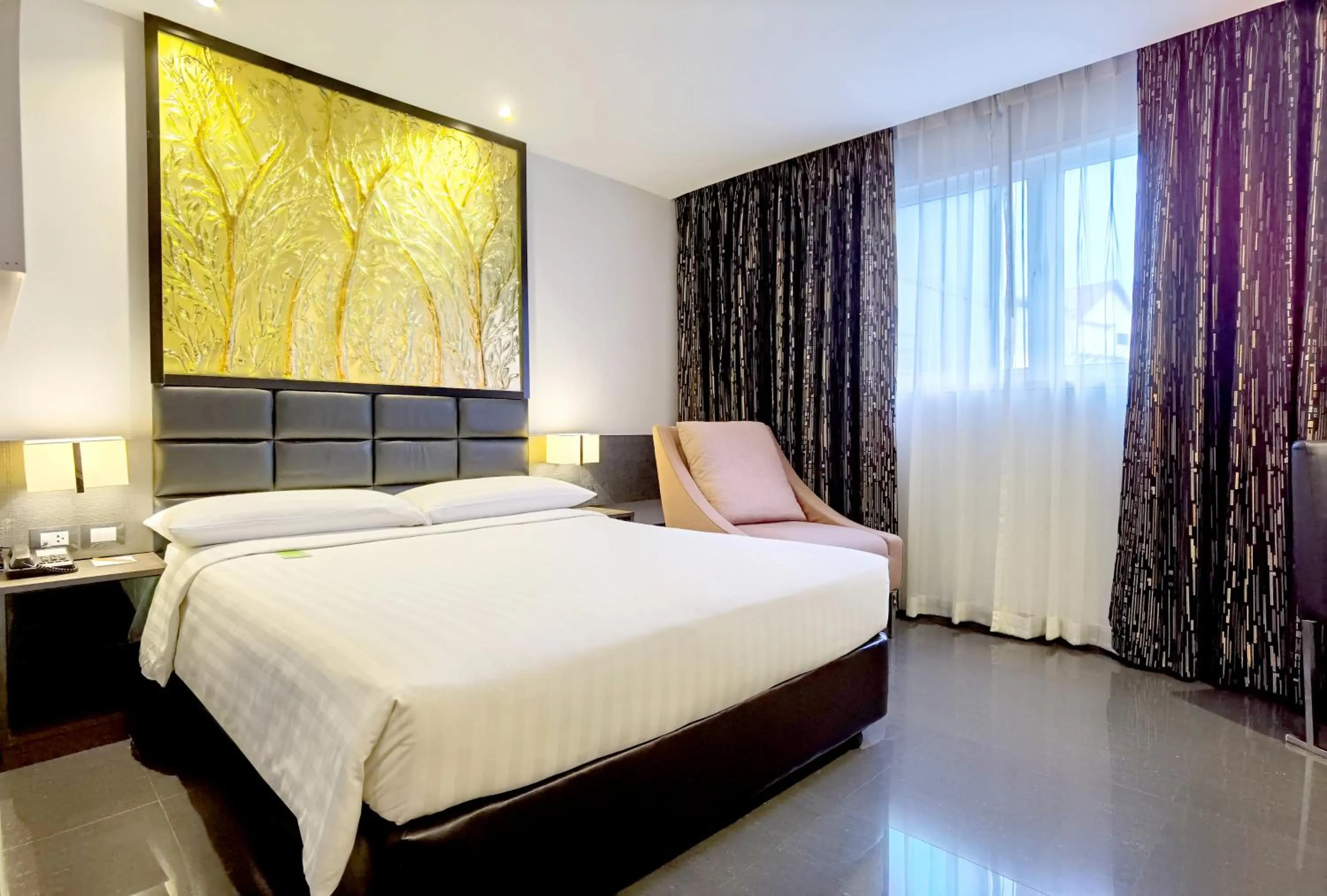 Bed in Nova Express Pattaya Hotel