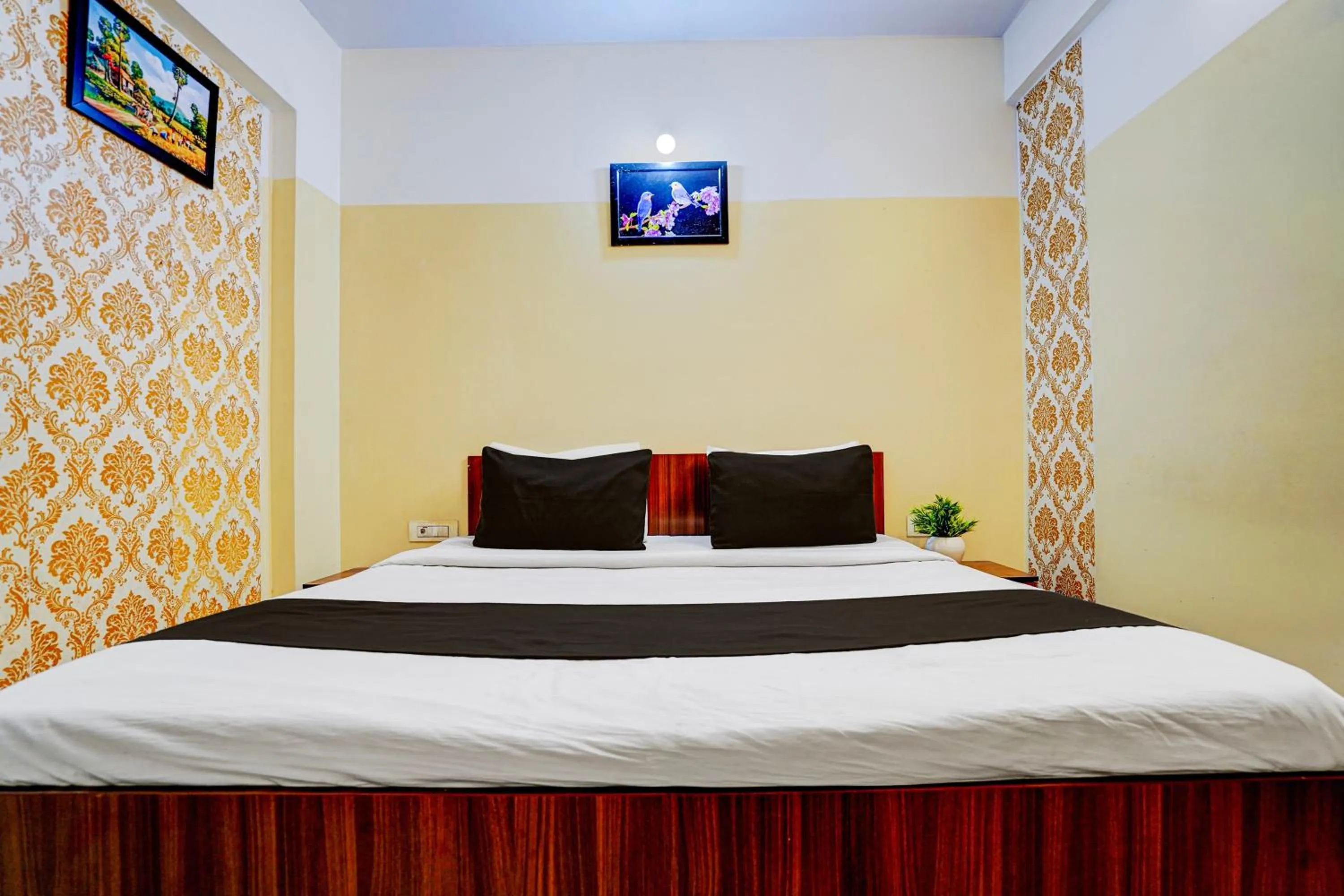 Bedroom, Bed in Hotel O Nesara Inn