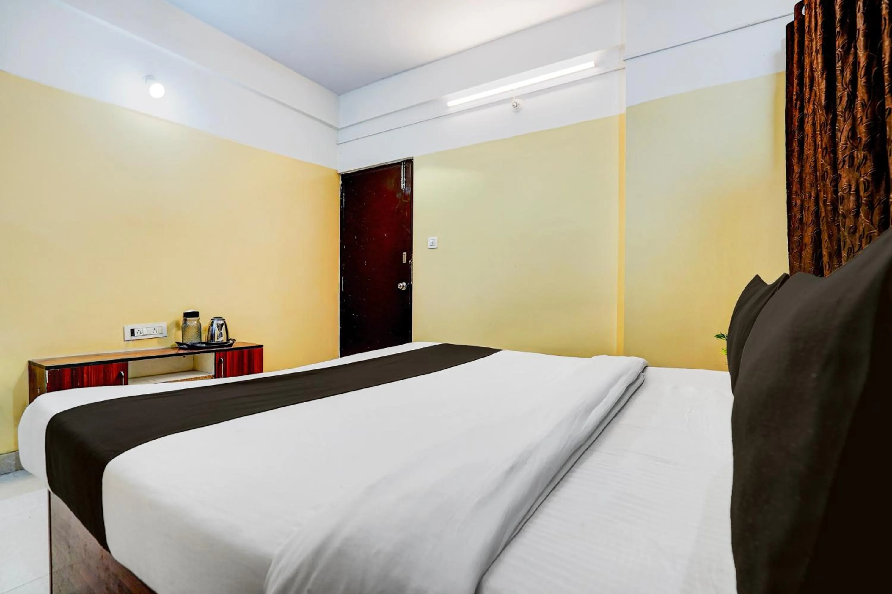 Bedroom, Bed in Hotel O Nesara Inn