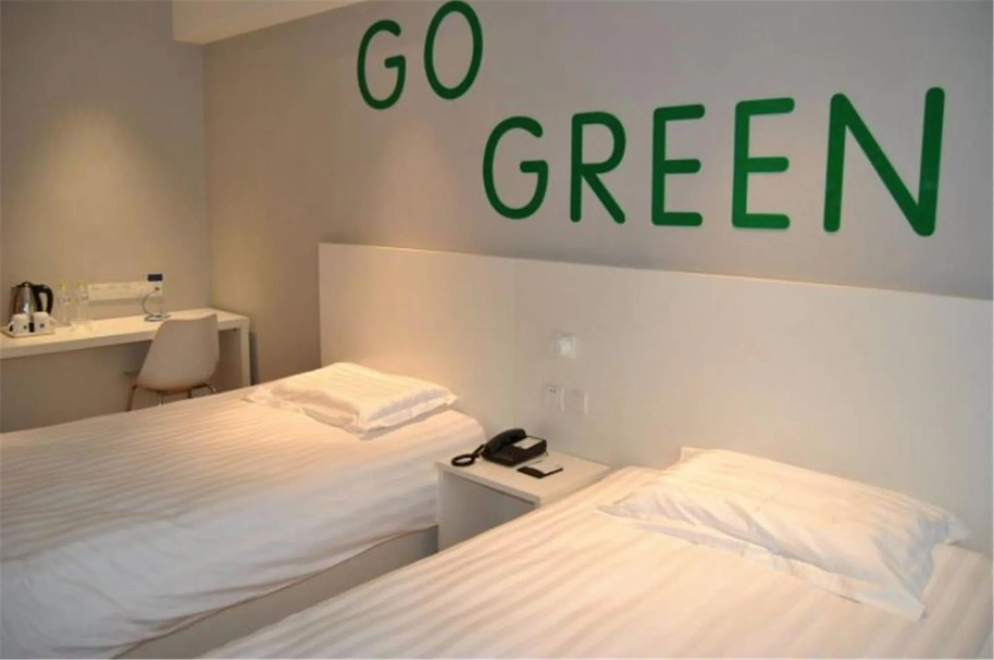 Bed in Motel Ji'nan Shandong University Shanda Road