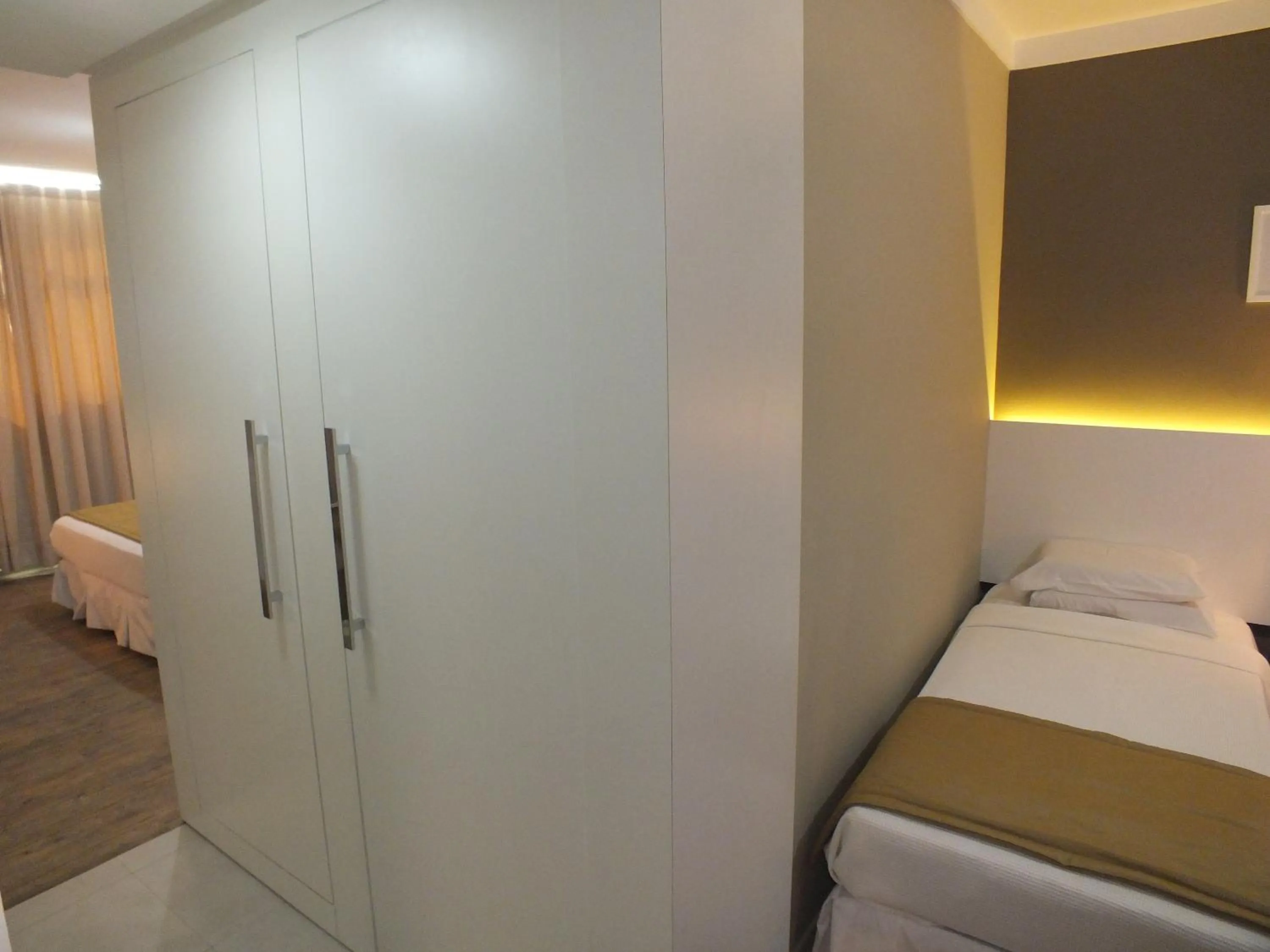 Bed in JB Palace Hotel