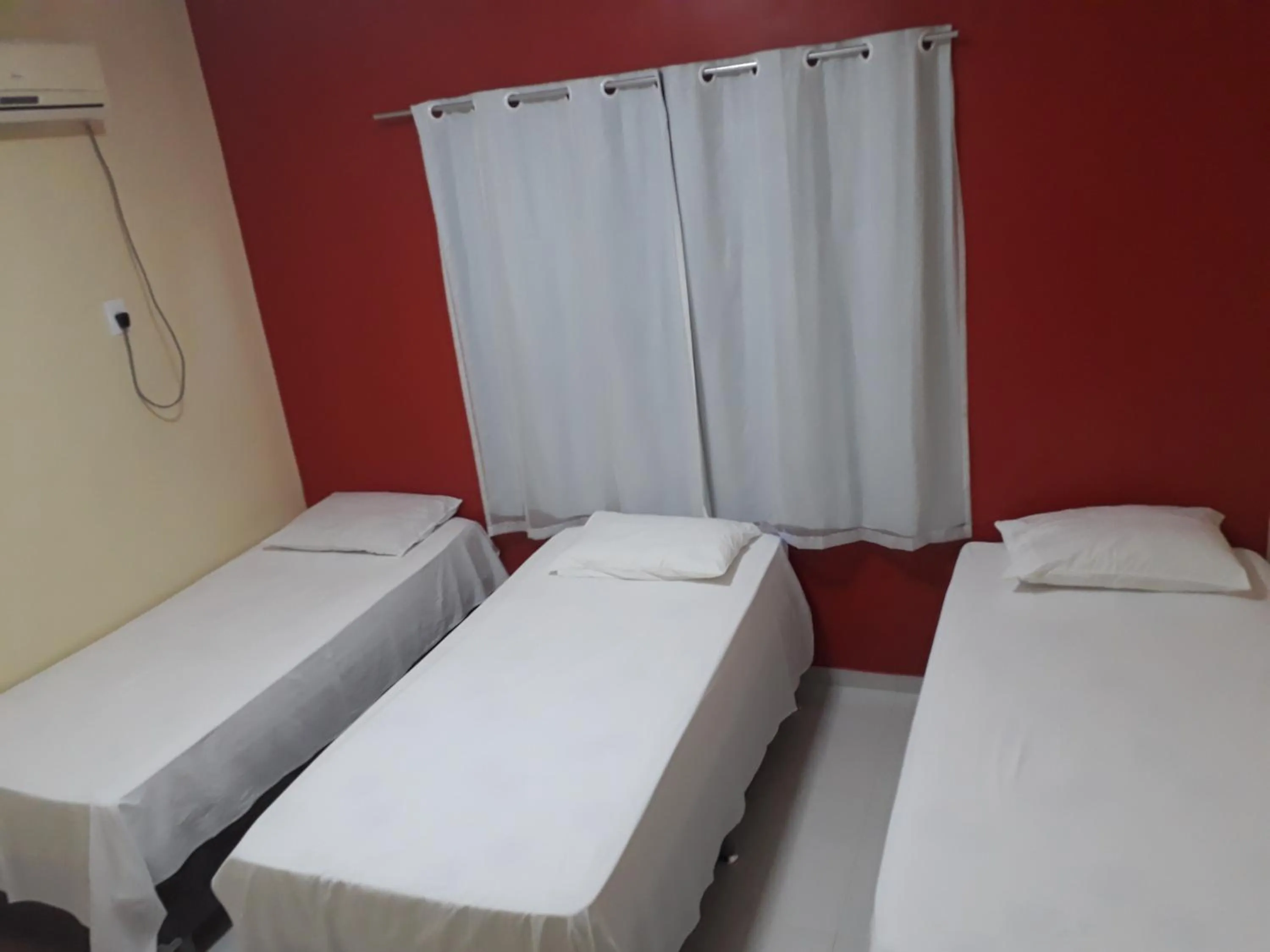 Bed in Pousada e Flats Golden Goes