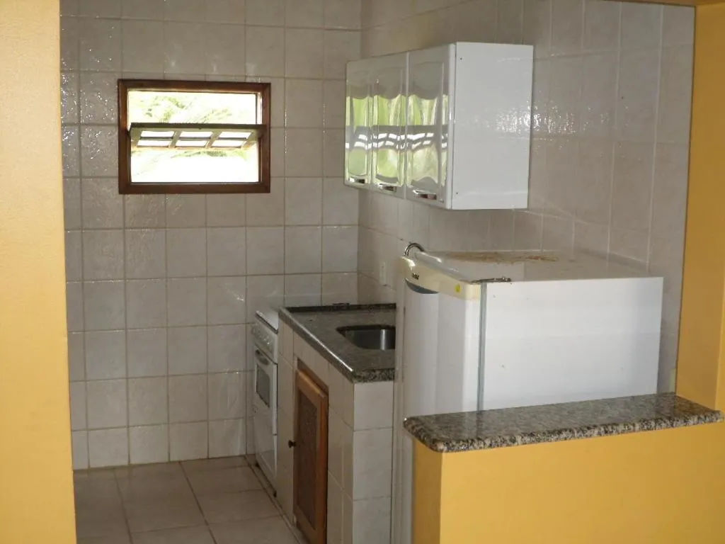 Kitchen or kitchenette in Pousada e Flats Golden Goes