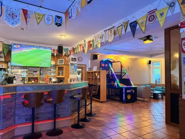 Communal lounge/ TV room in Sportschule Bitburg - Sportpark-Hotel