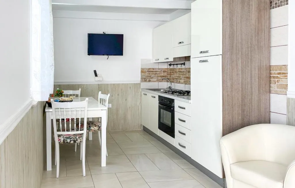 Kitchen or kitchenette in Re Sole Resort&Spa