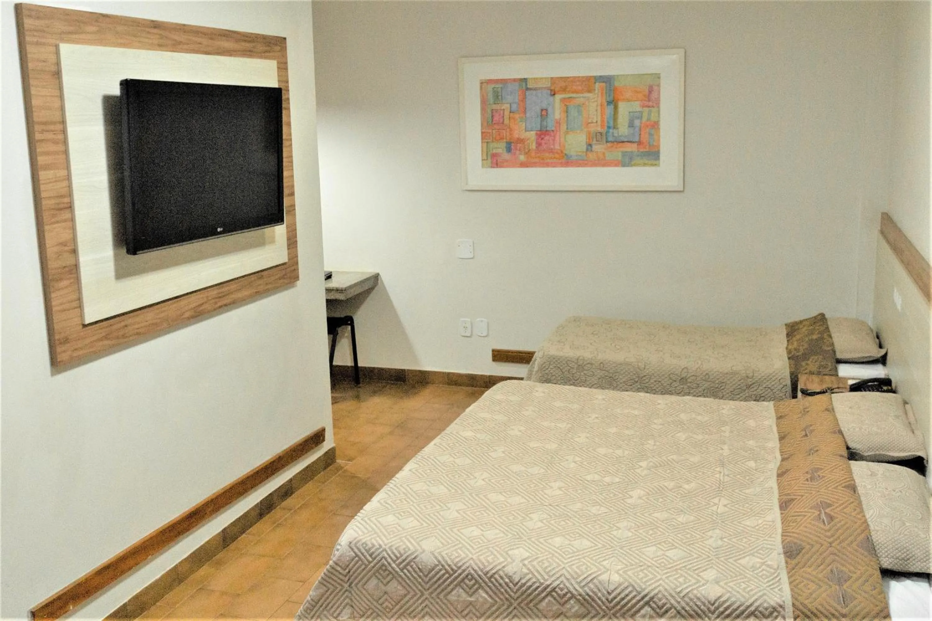 Bed in Hotel Pouso Novo