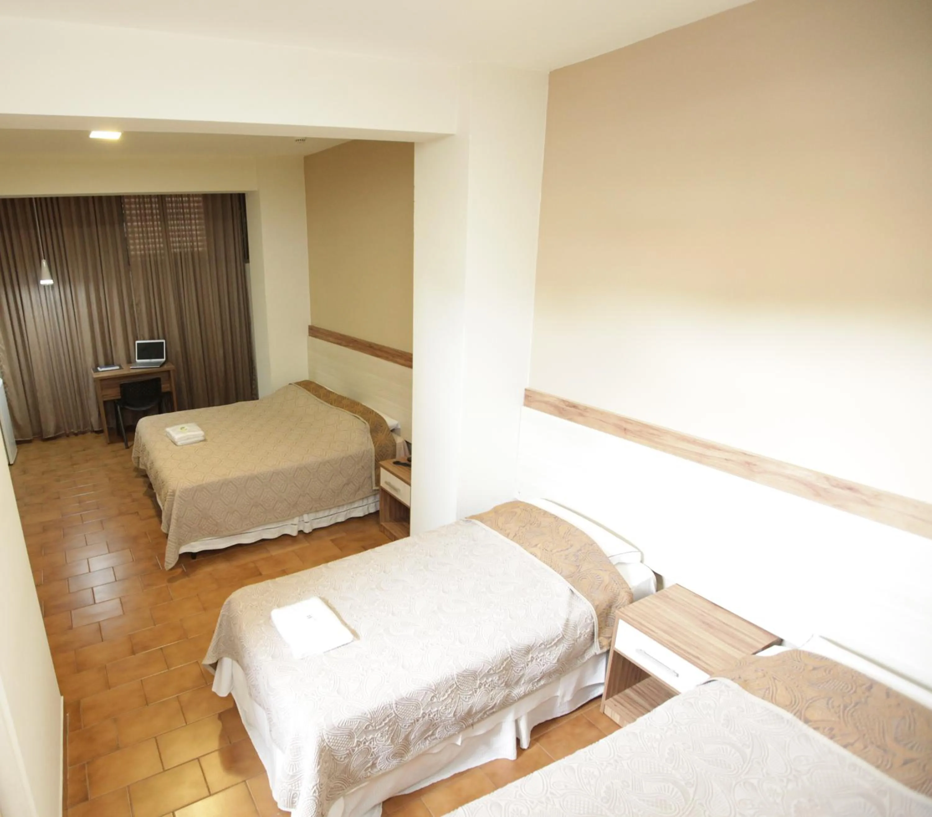 Bed in Hotel Pouso Novo