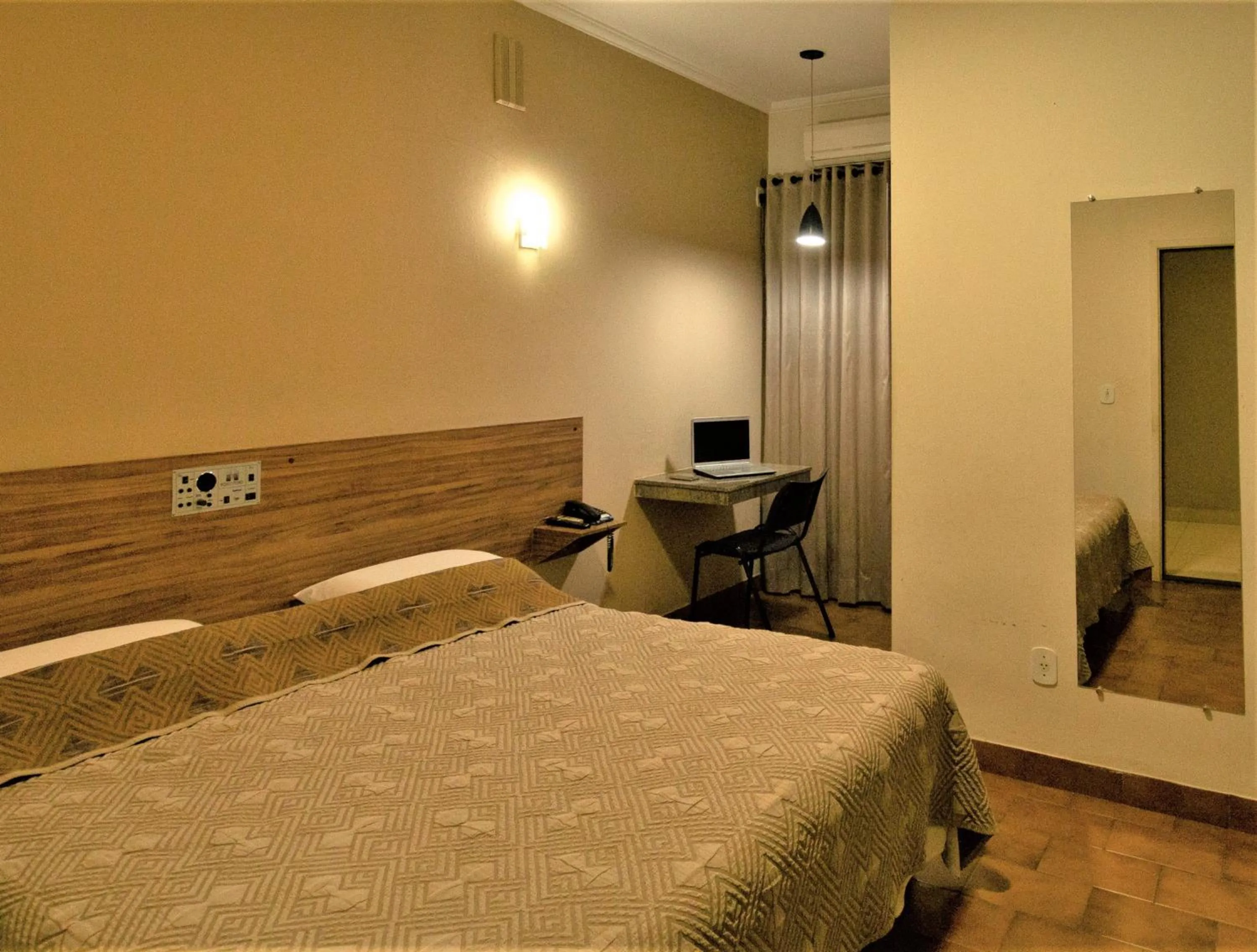 Bed in Hotel Pouso Novo