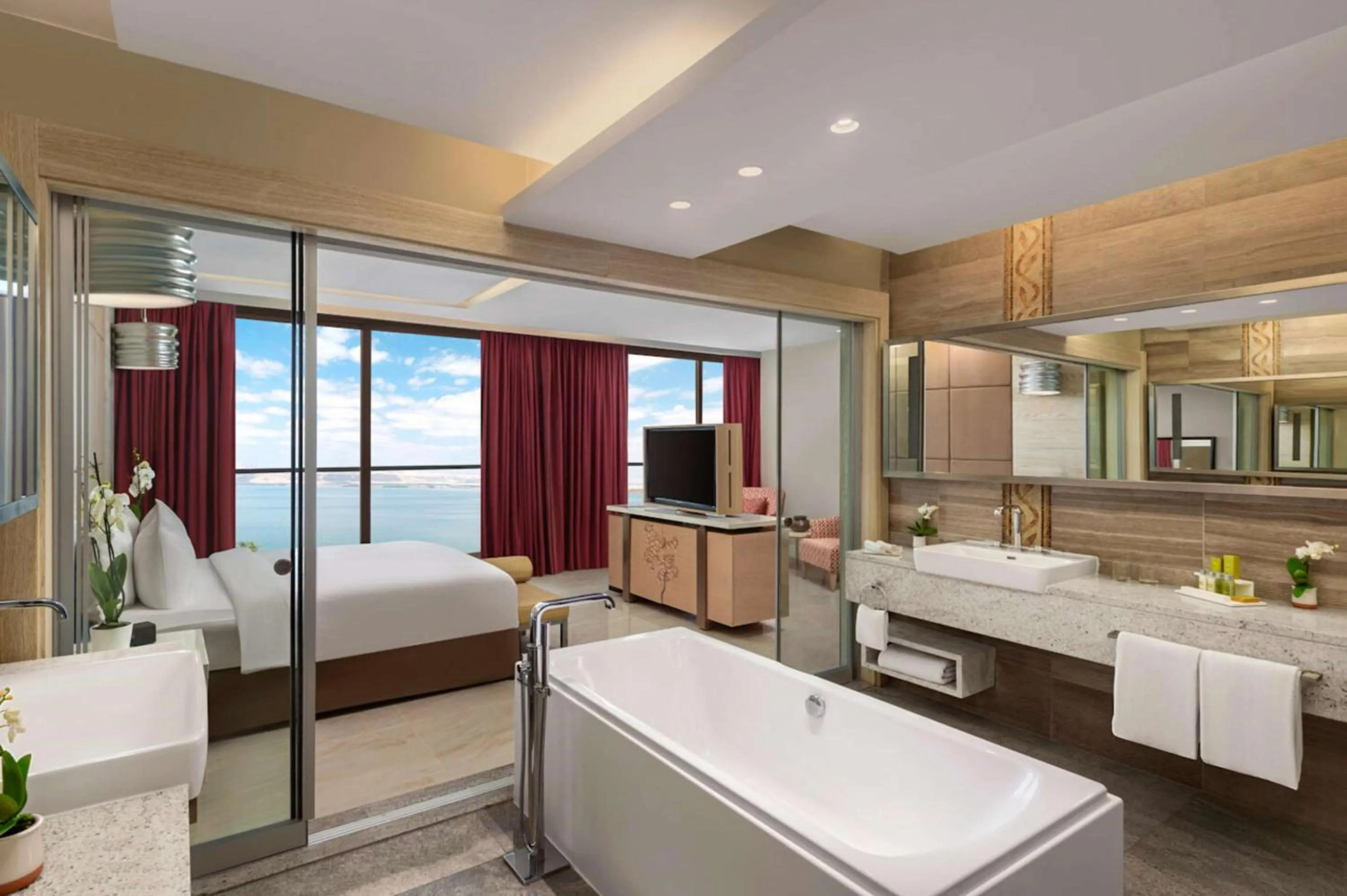 Bathroom, Bed in Hilton Dead Sea Resort & Spa