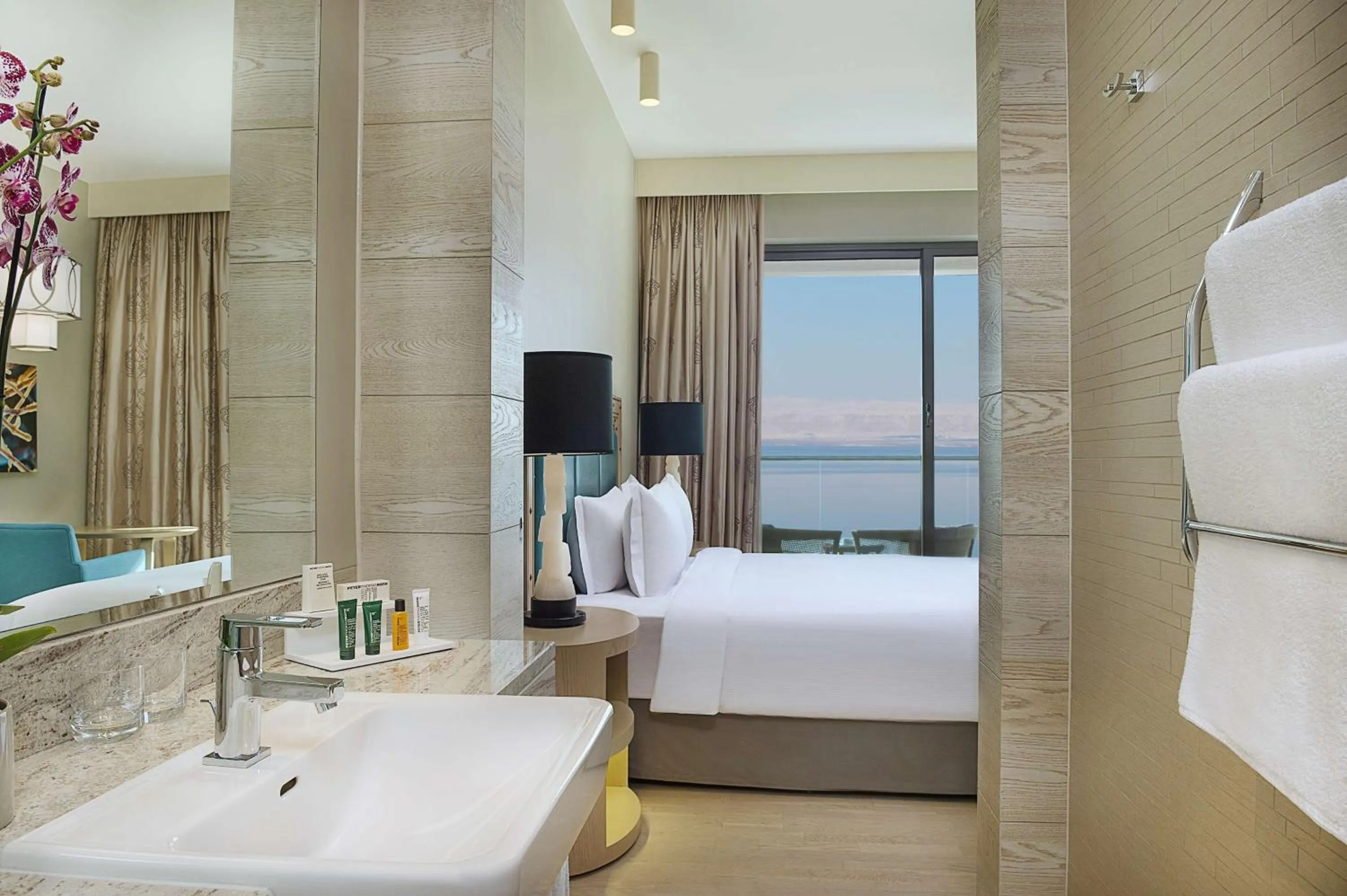Bathroom, Bed in Hilton Dead Sea Resort & Spa