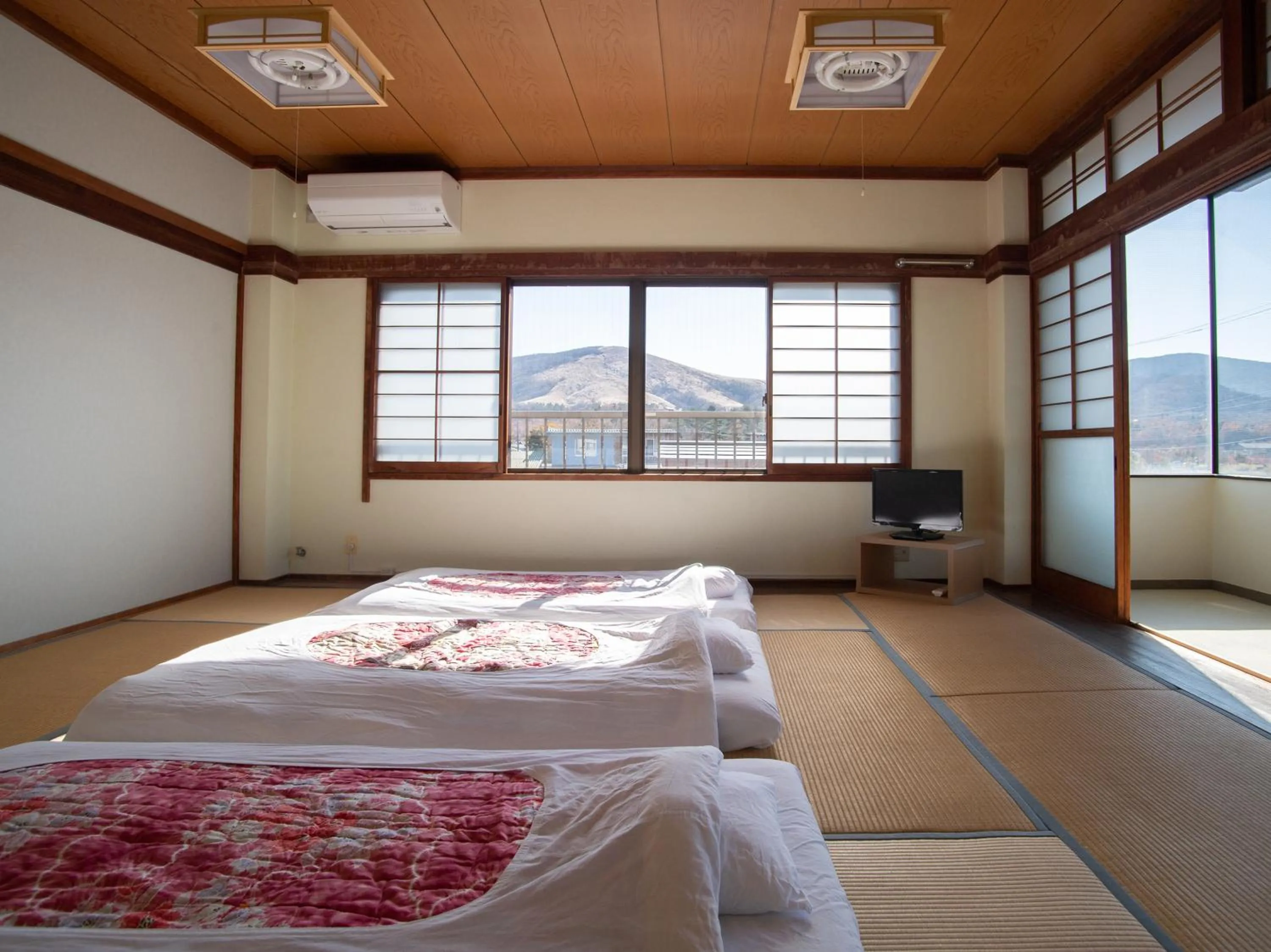 View (from property/room), Bed in Tabist Lakeside in Fujinami Yamanakako