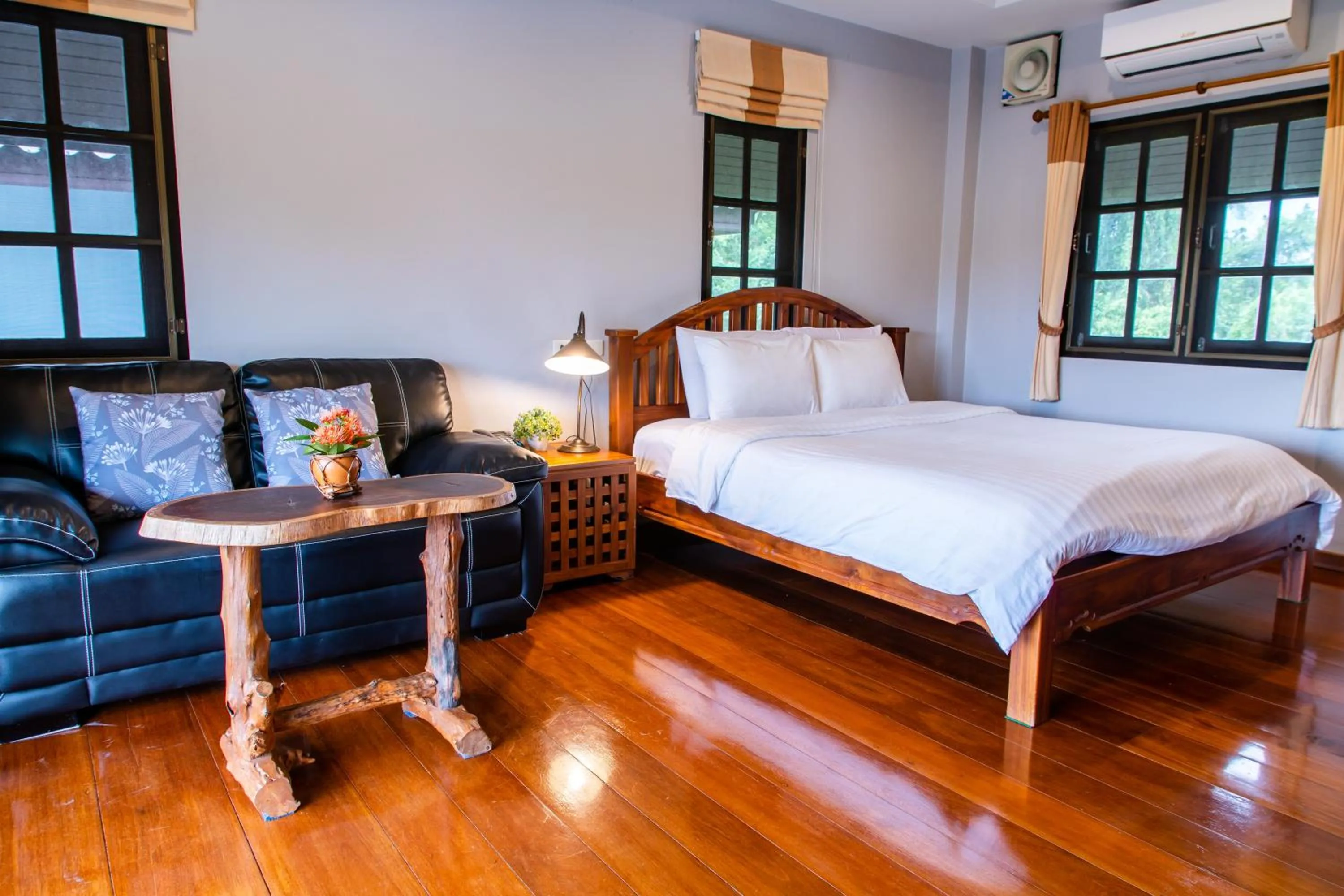 Bed in BaanRimNam Resort Trat