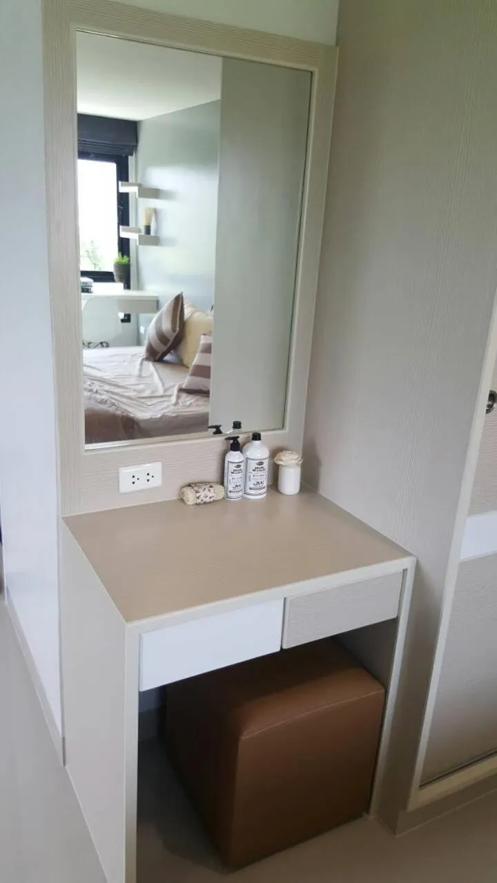 Bed in JK LIVING Hotel And Service Apartment