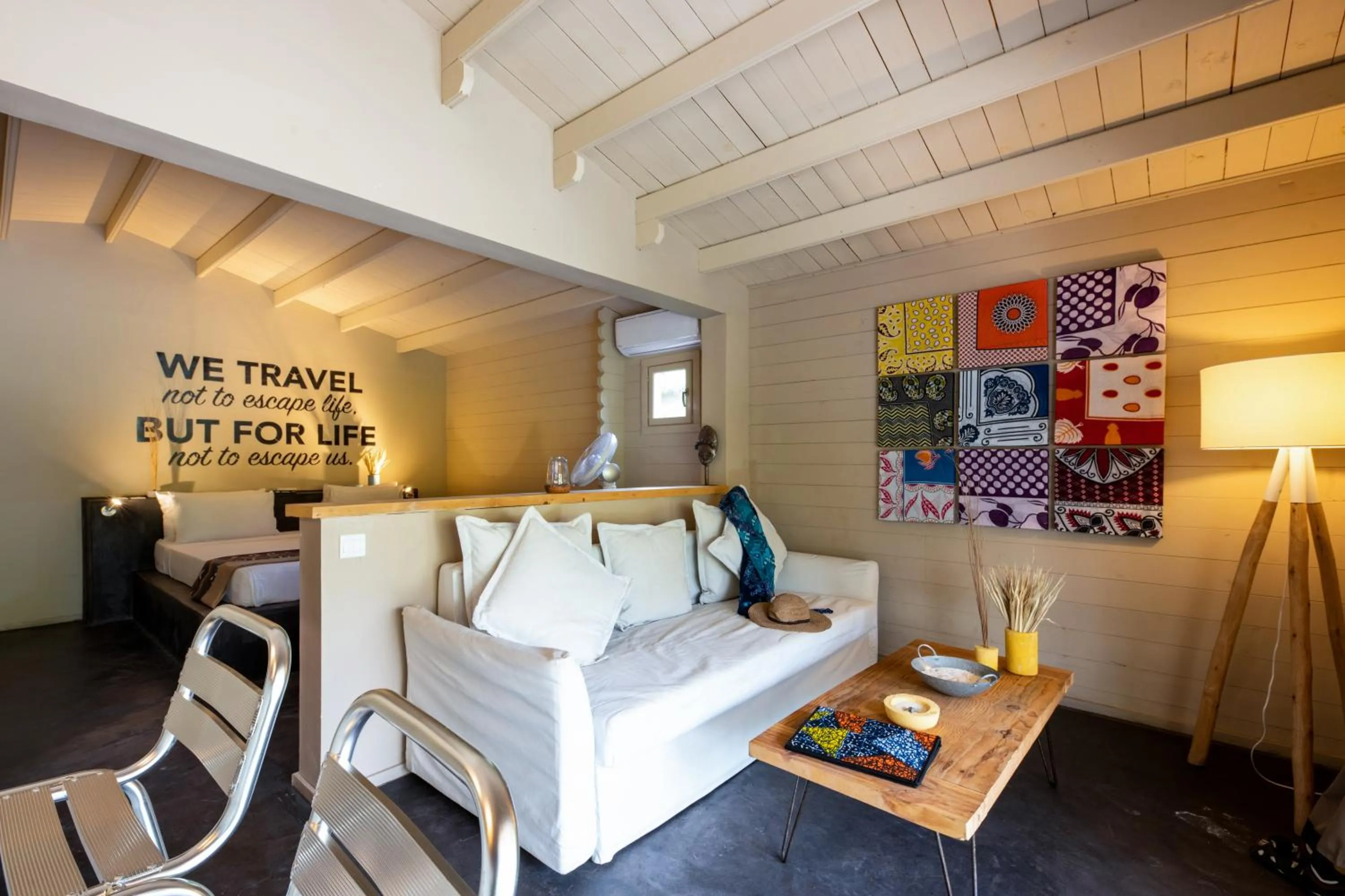 Seating area, Bed in Mwezi Boutique Resort