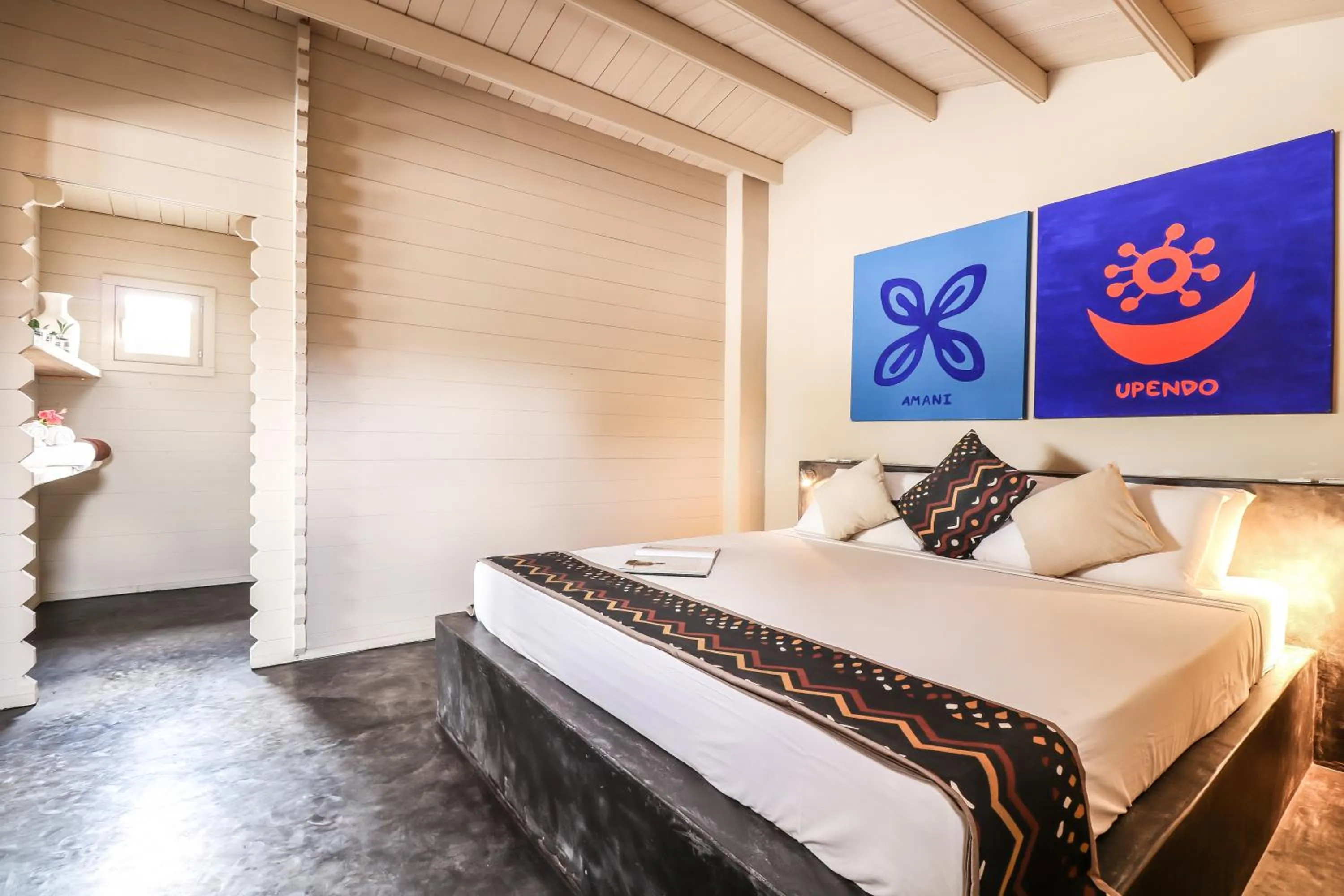 Bed in Mwezi Boutique Resort