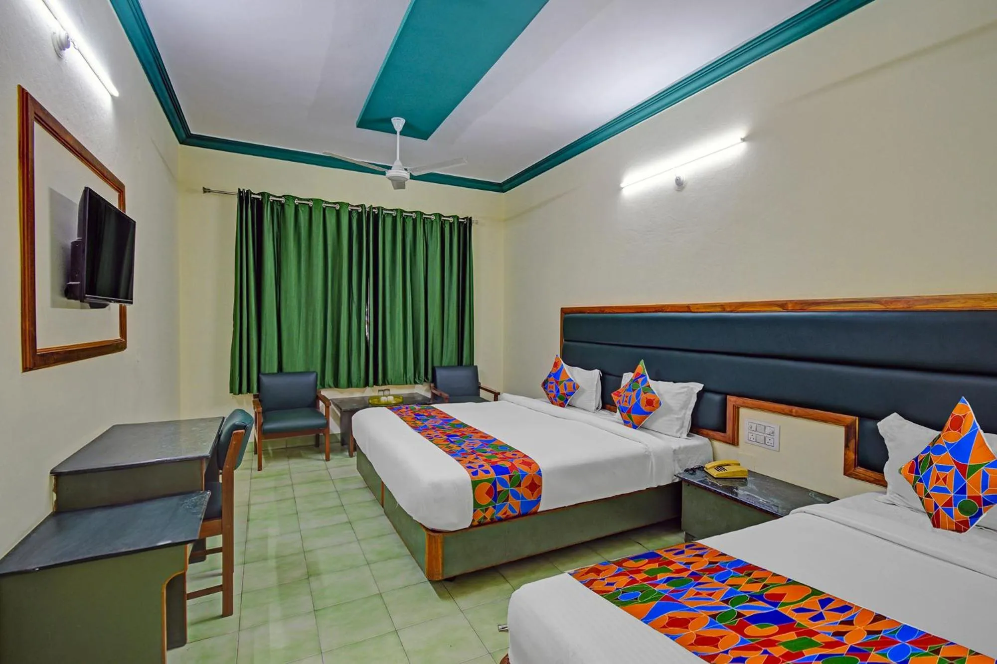 Bed in FabHotel Ranjit Residency