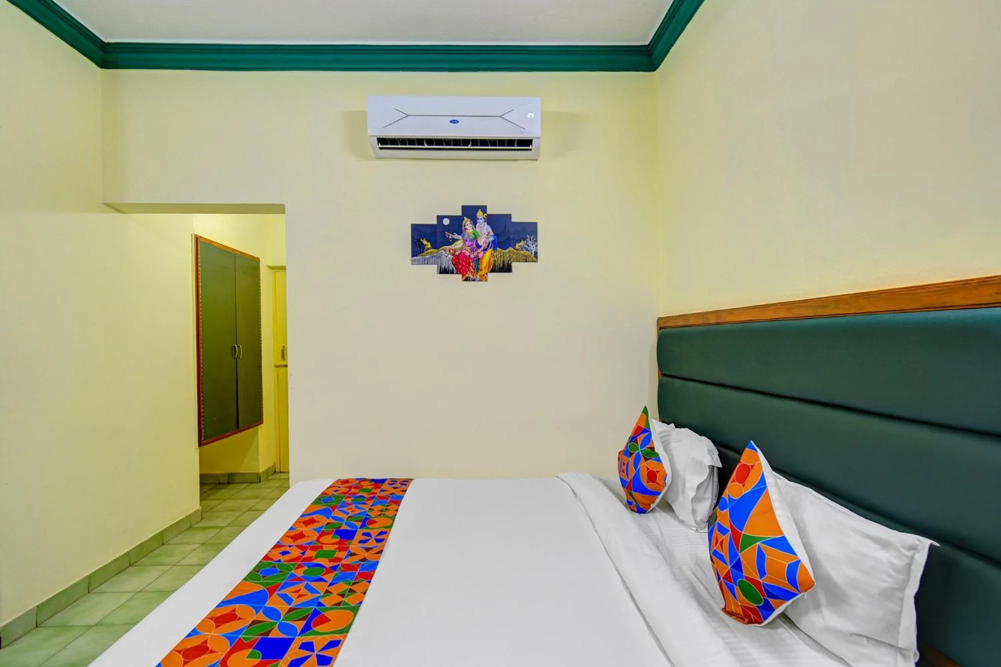 Bed in FabHotel Ranjit Residency