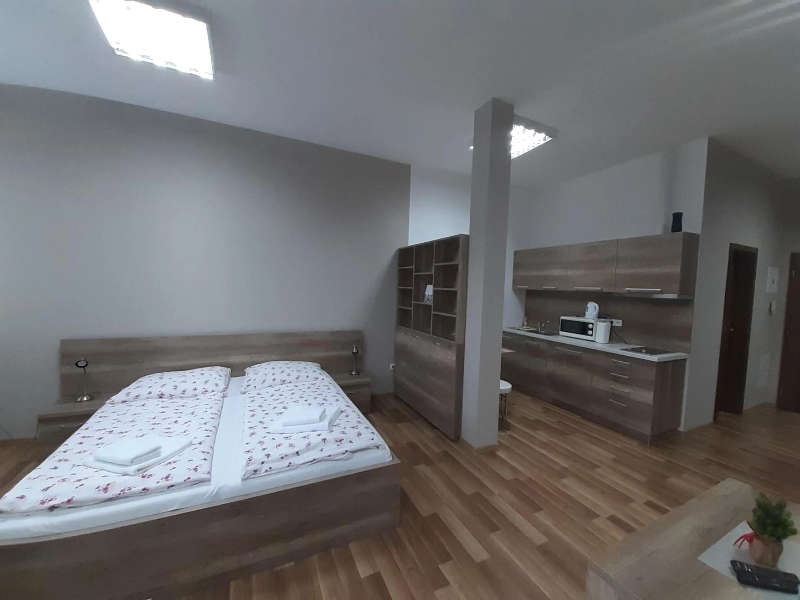 Kitchen or kitchenette, Bed in Apartments MODOM