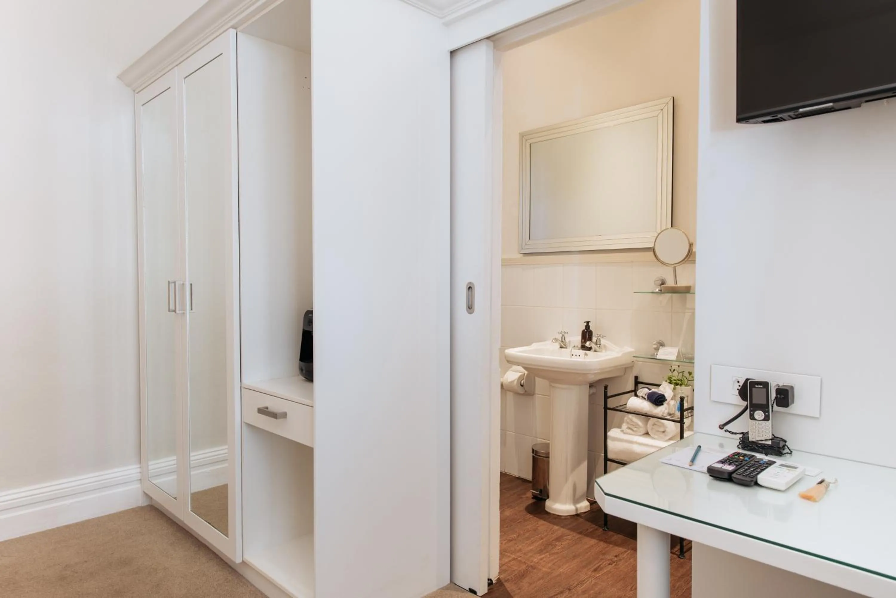 TV and multimedia in River Manor Boutique Hotel by The Living Journey Collection