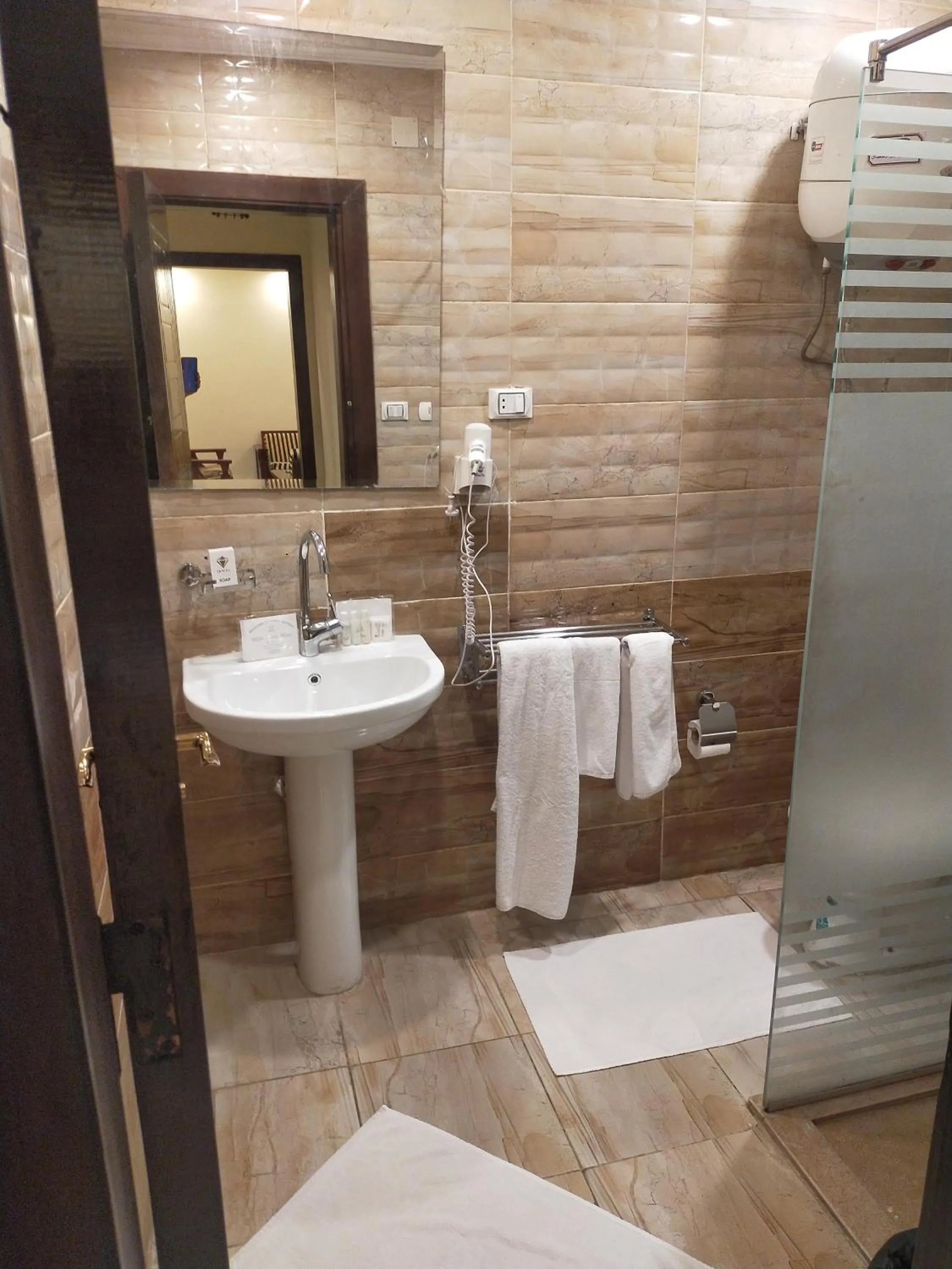 Bathroom in 26th of July Apartments