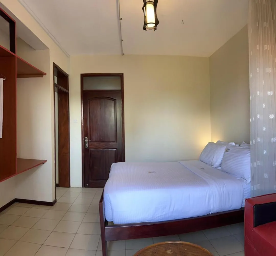 Bed in Hotel Royal Nest Entebbe