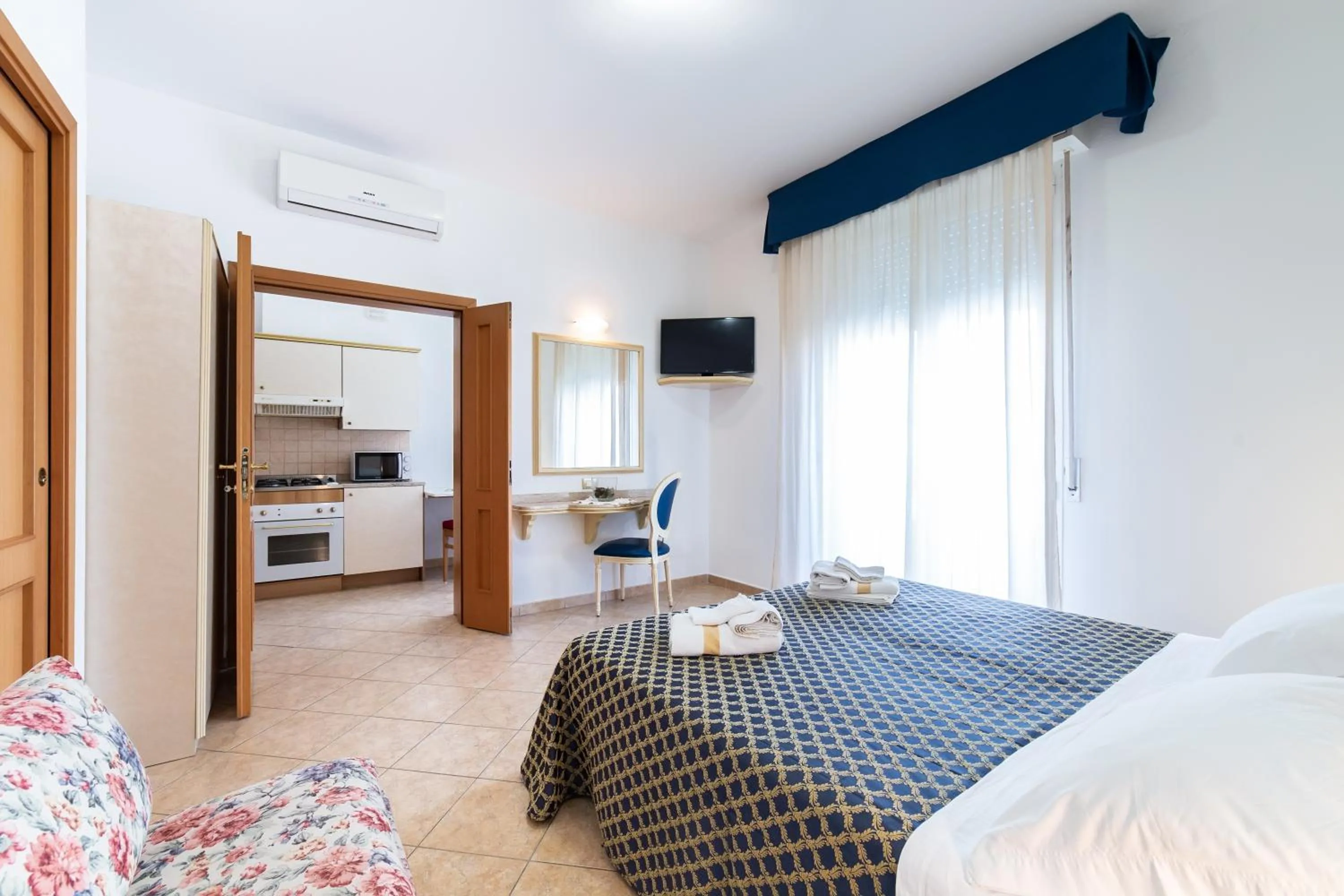 Kitchen or kitchenette, Bed in Residenza Melucci