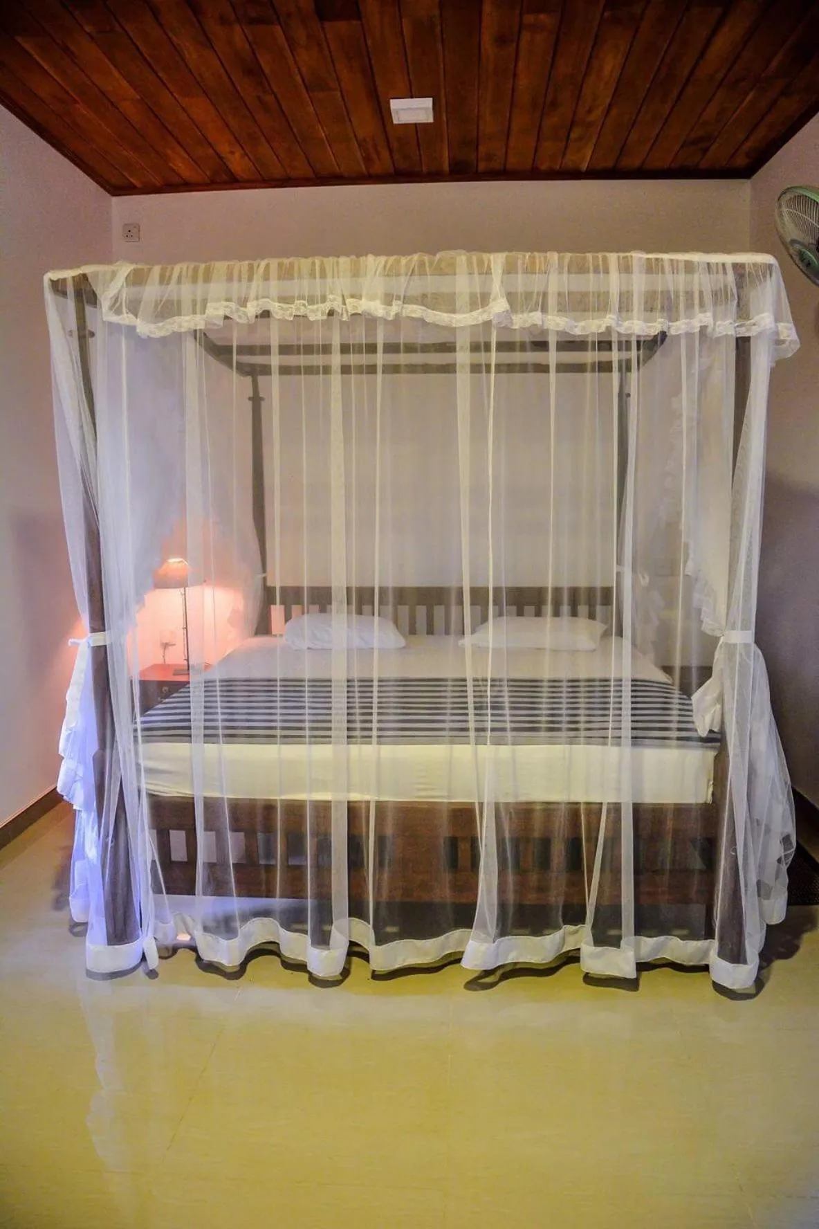 Bed in Shehani Beach Bungalow