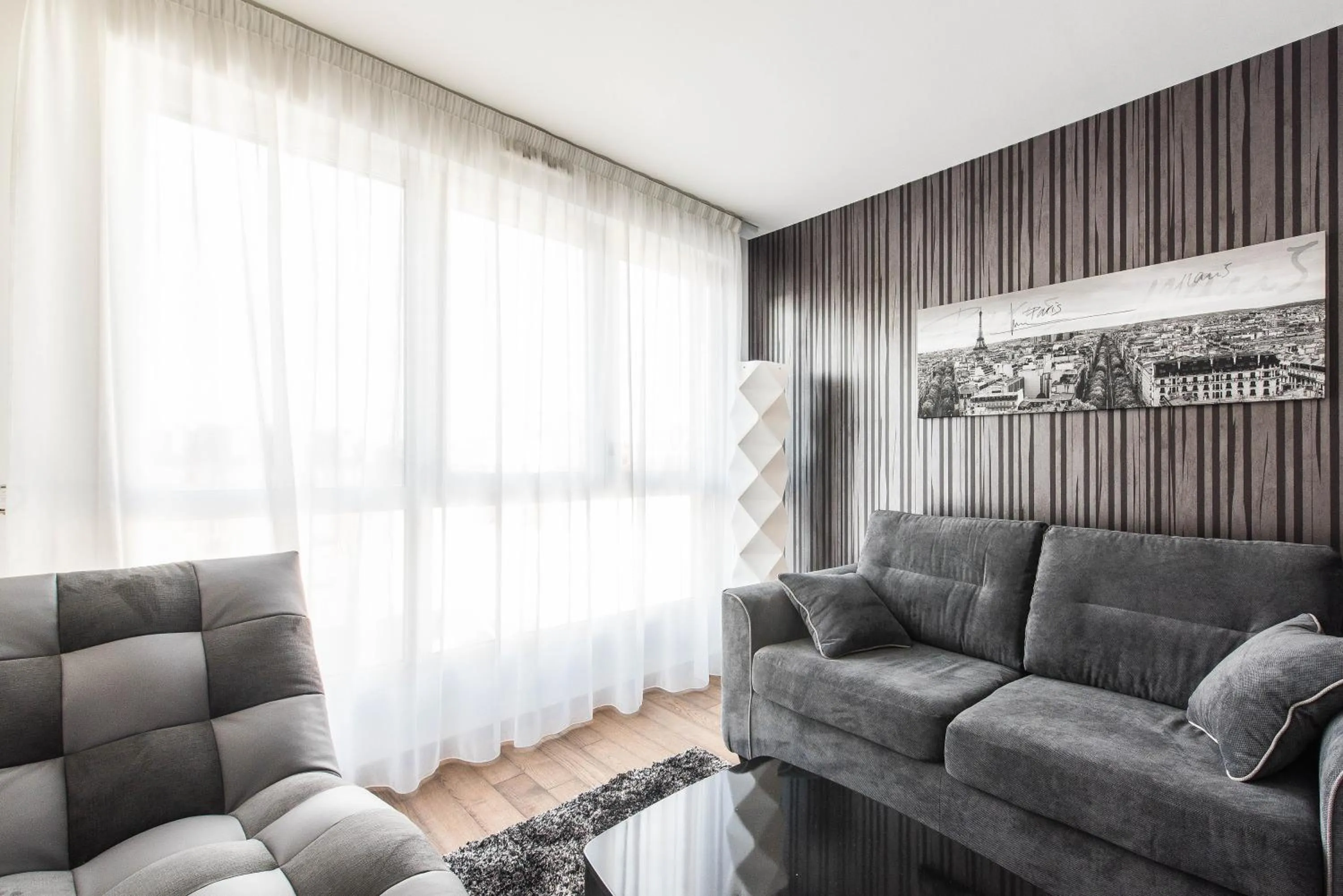 Living room in Les Appartements Paris Clichy