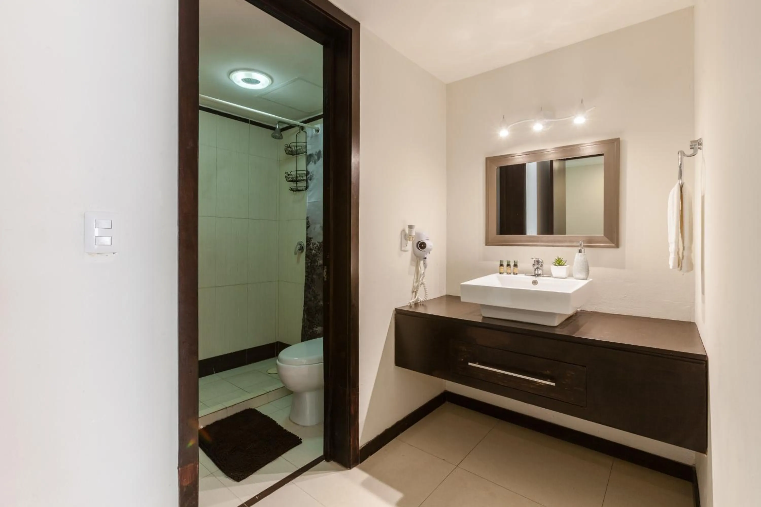 Shower in Via Tendenza Condos