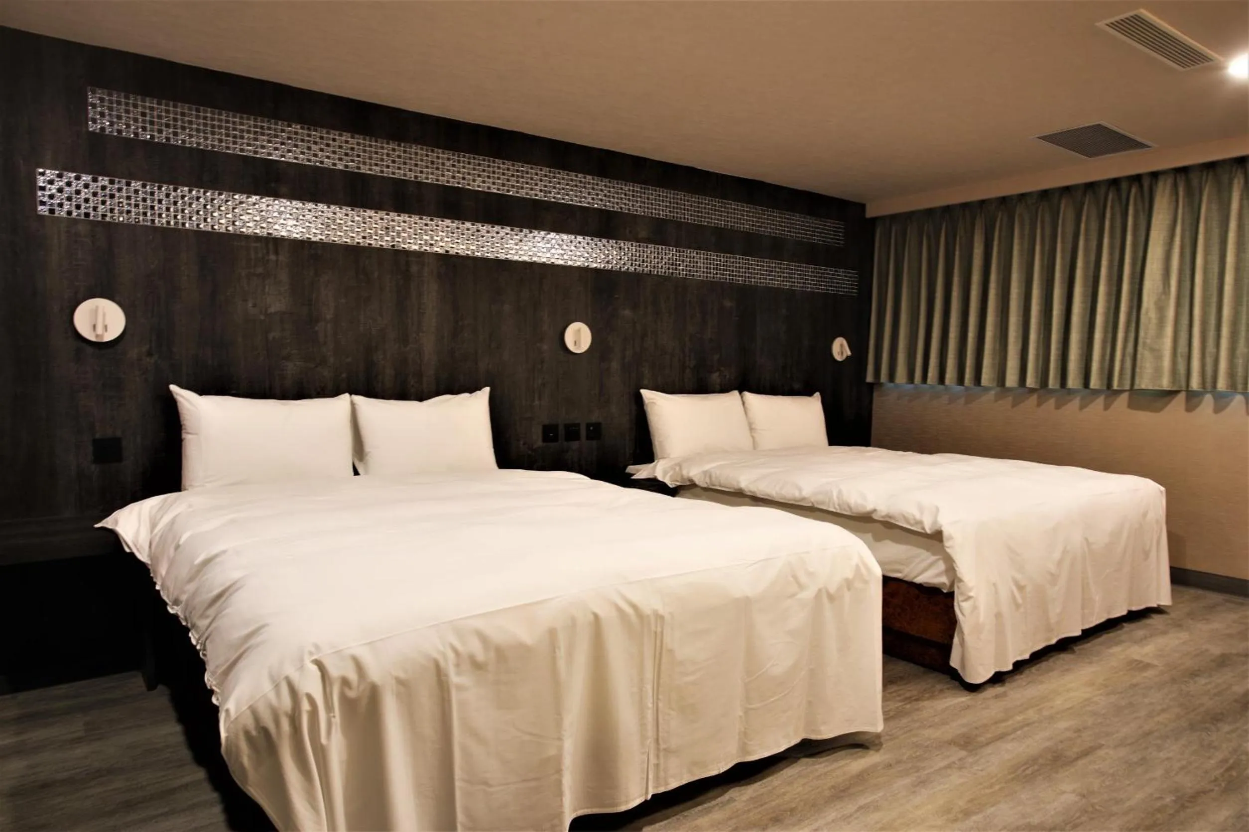 Bed in Golden Home Hotel