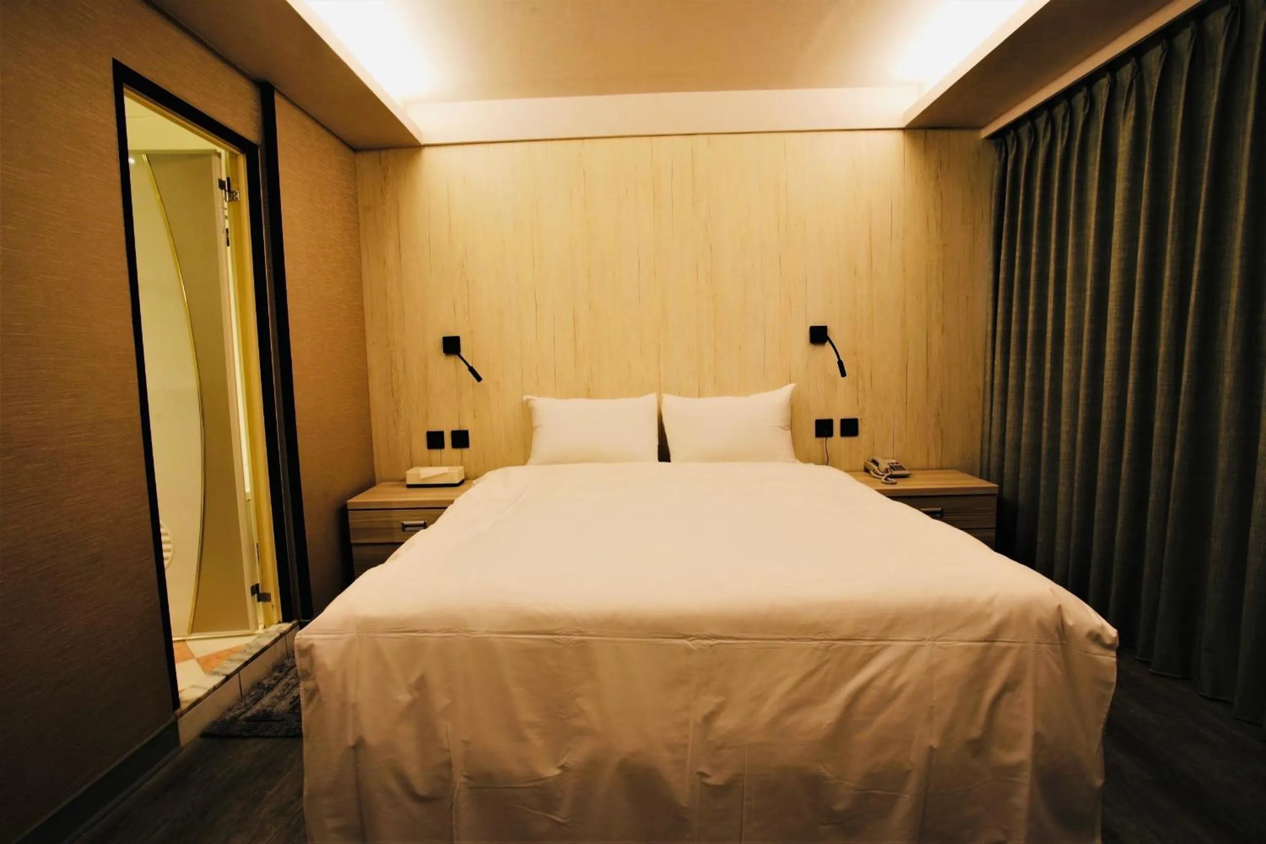 Bed in Golden Home Hotel