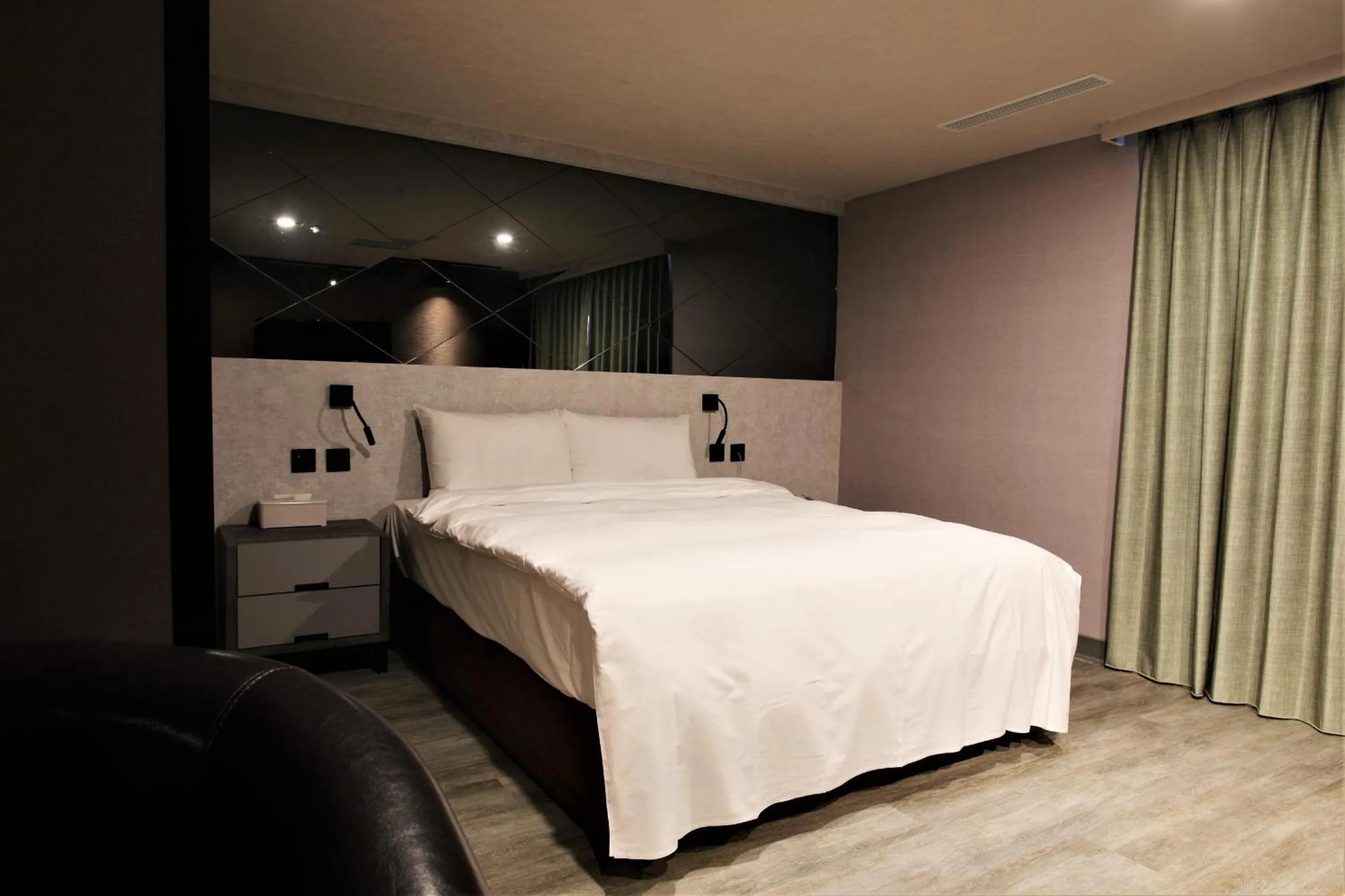 Bed in Golden Home Hotel