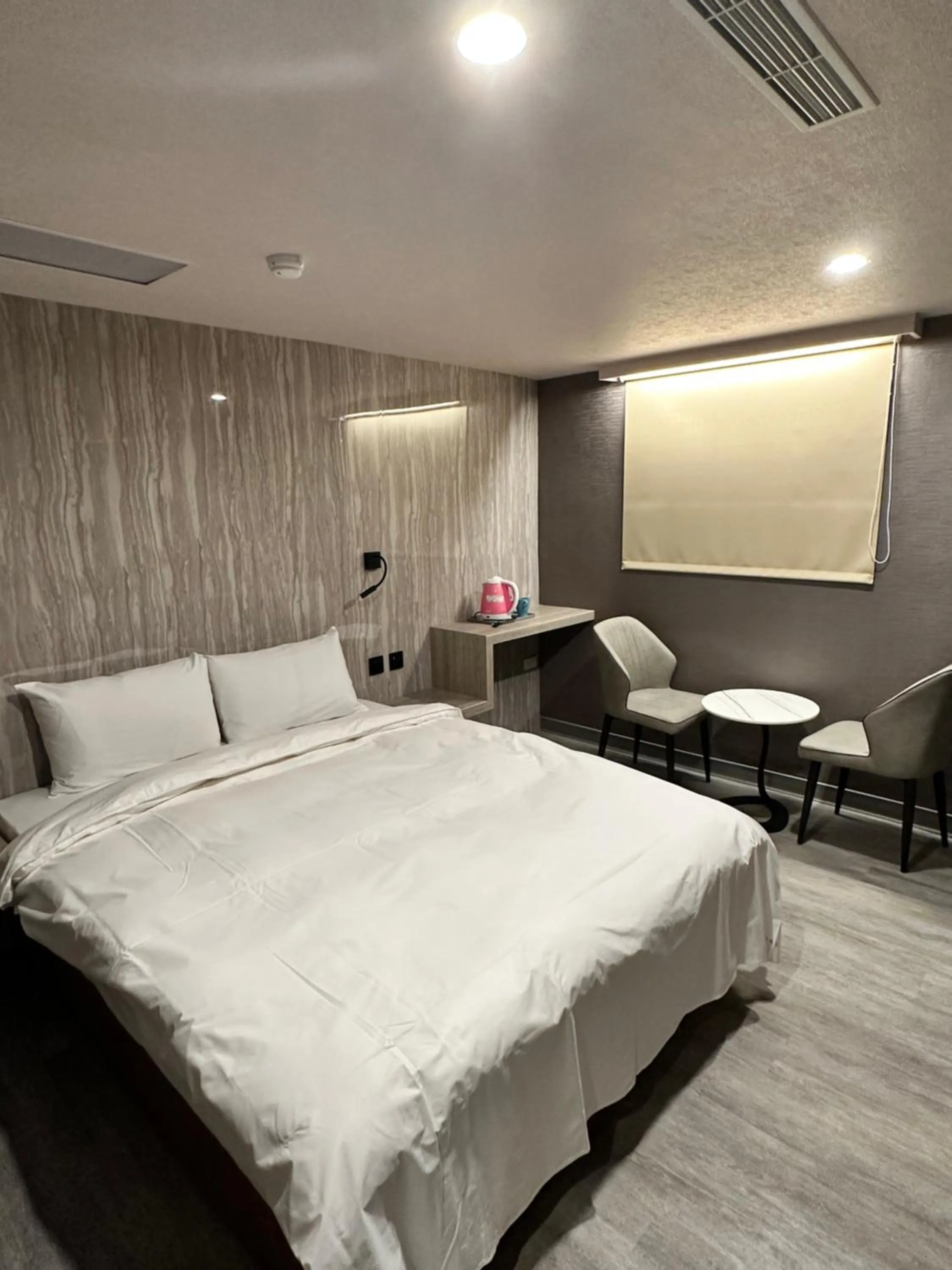 Bed in Golden Home Hotel