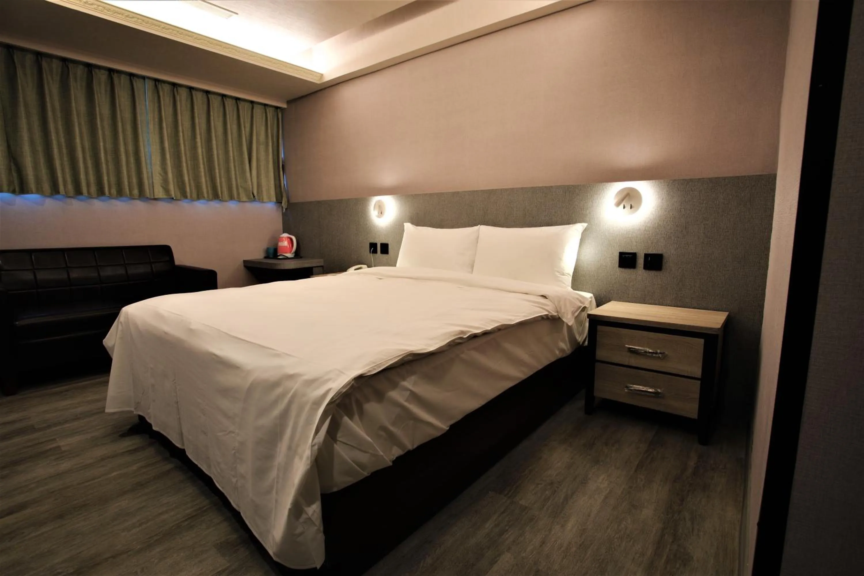 Bed in Golden Home Hotel