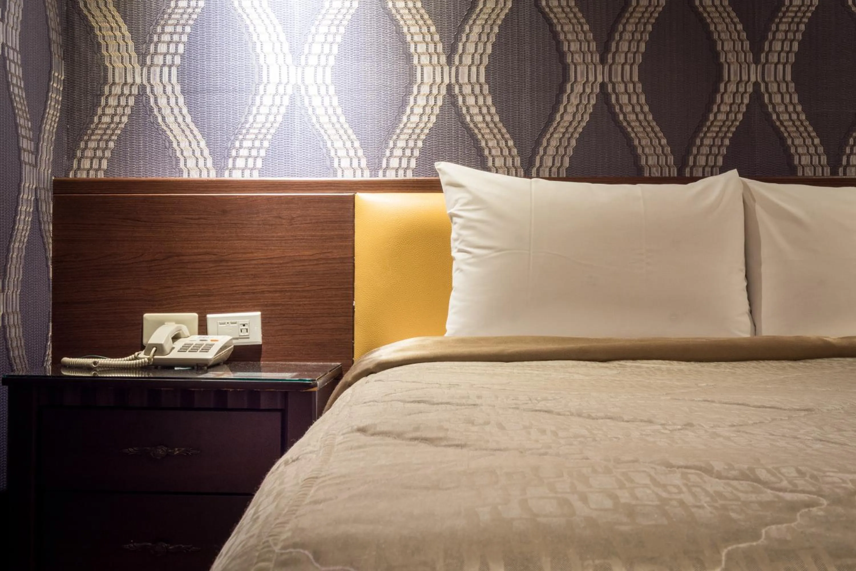 Bed in Golden Home Hotel