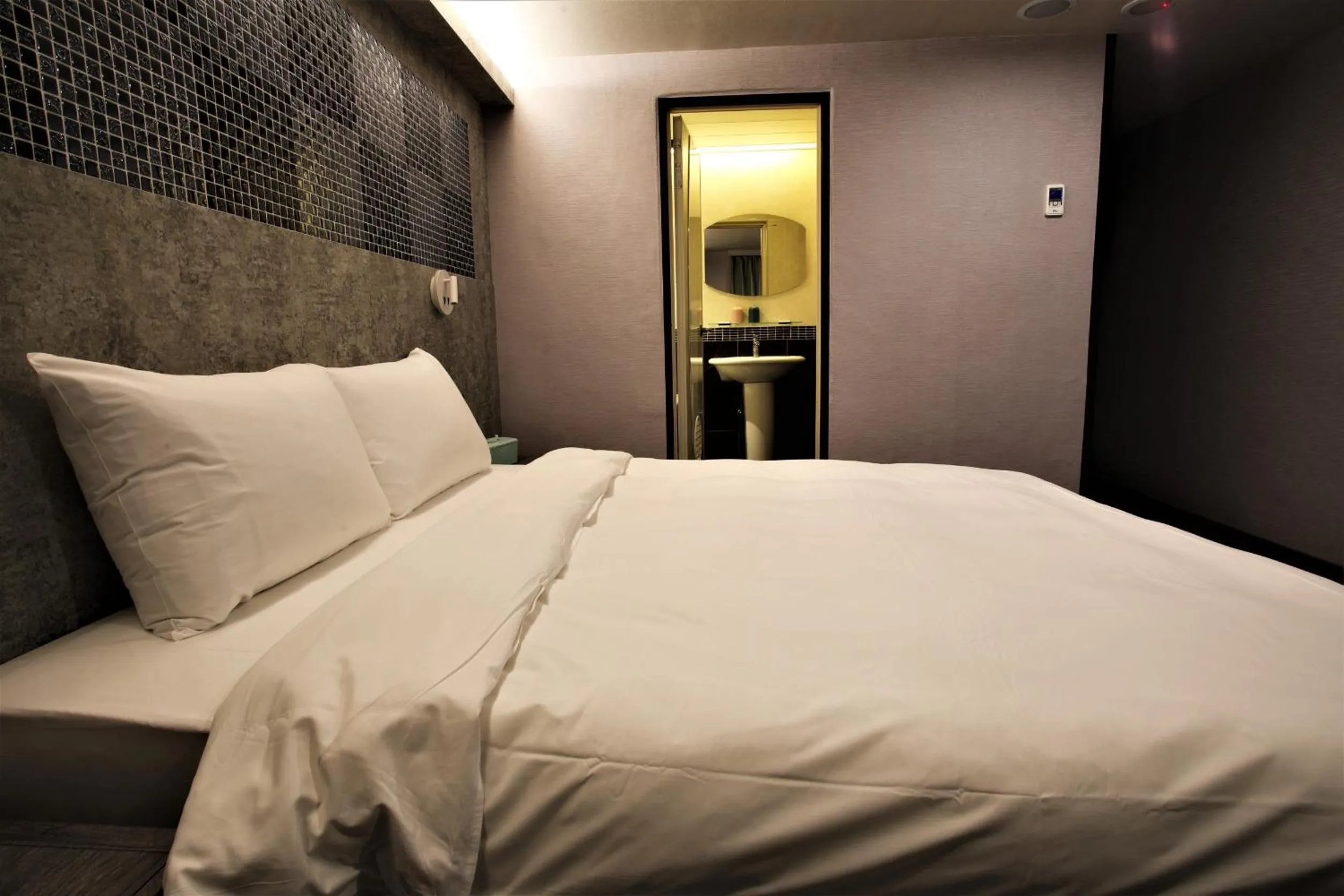 Bed in Golden Home Hotel