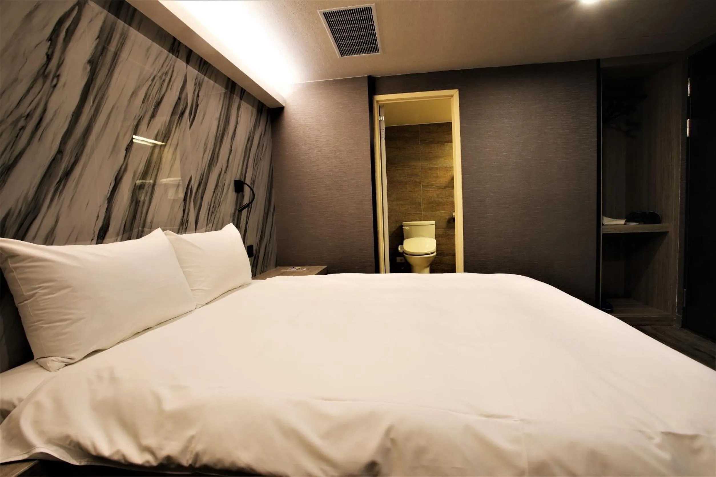 Bed in Golden Home Hotel