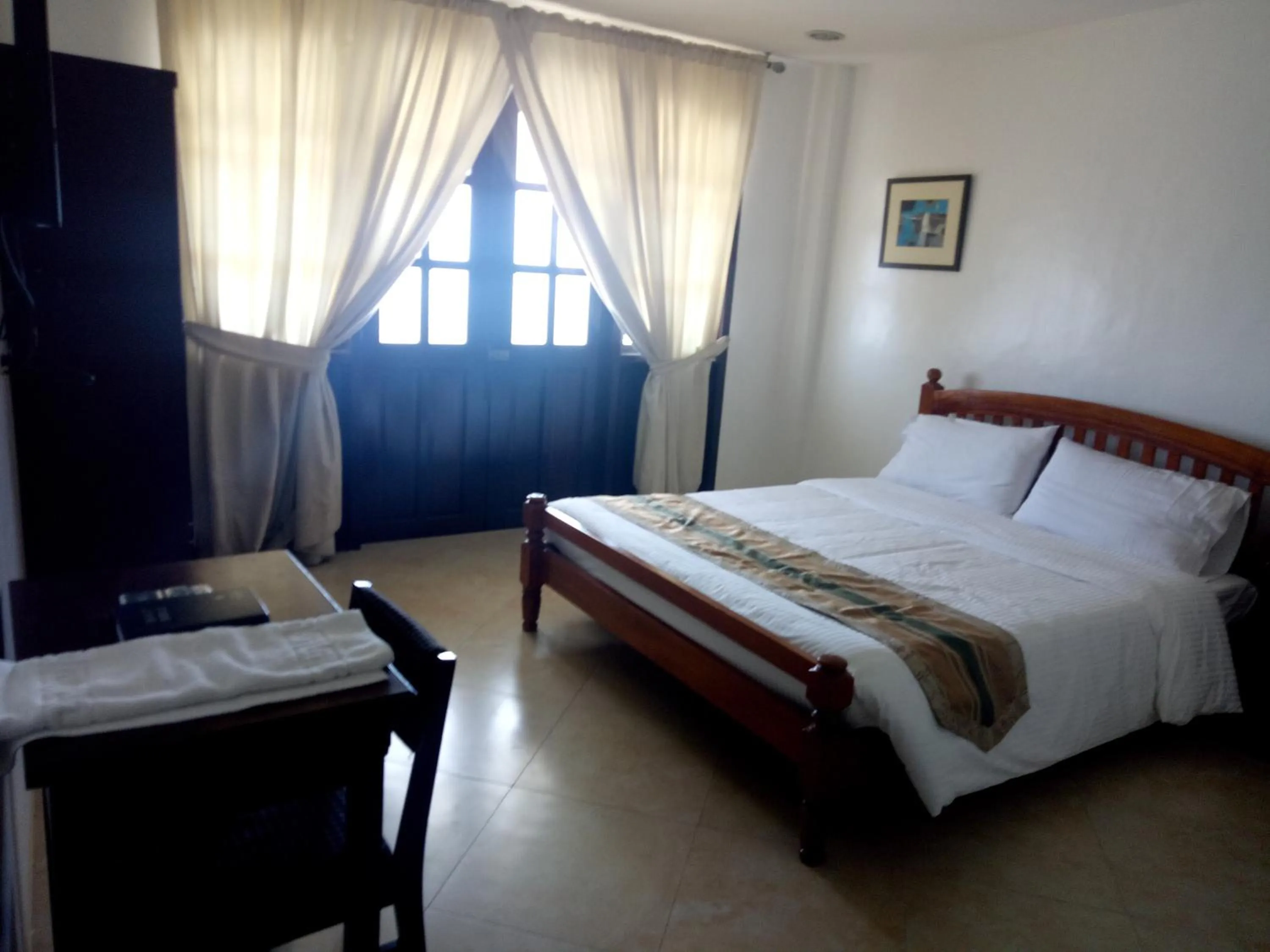Photo of the whole room, Bed in Metro Vigan Inn