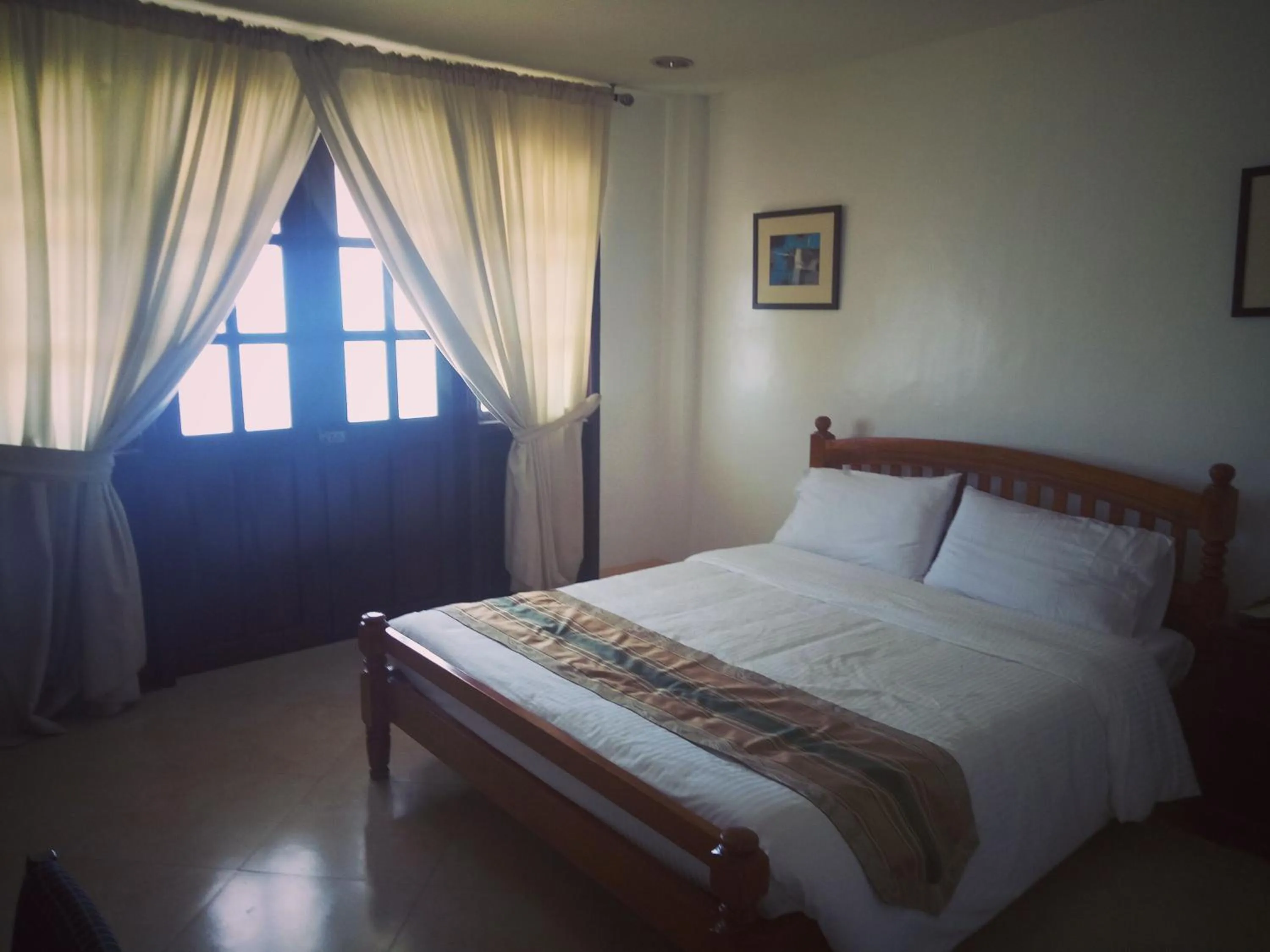 Photo of the whole room, Bed in Metro Vigan Inn
