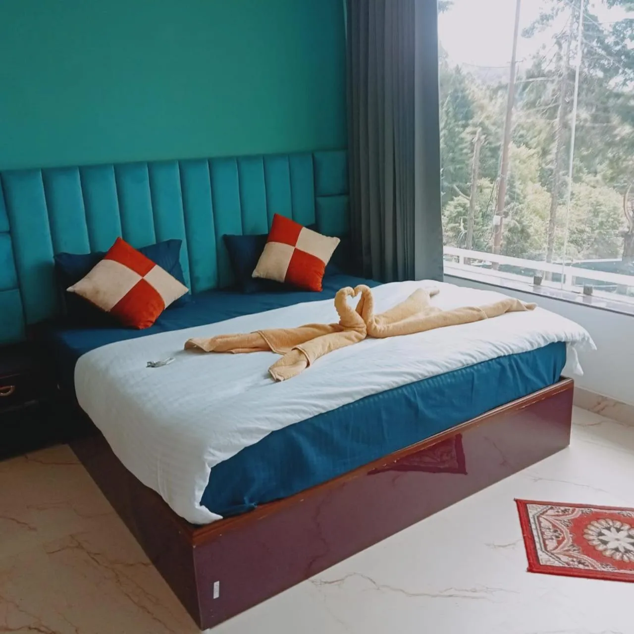 Bed in Rudraksh Resort