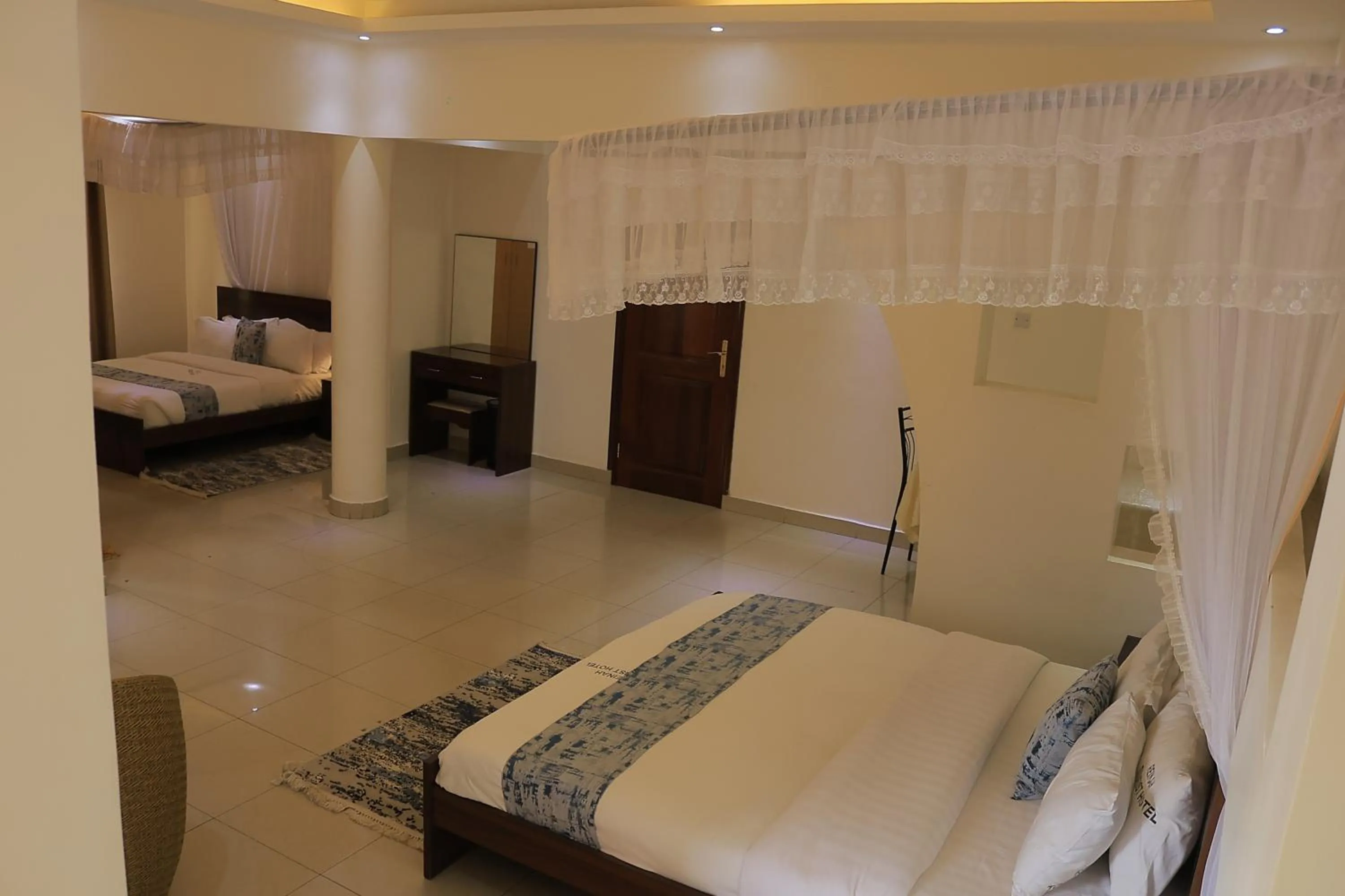 Photo of the whole room, Bed in Reinah Tourist Hotel